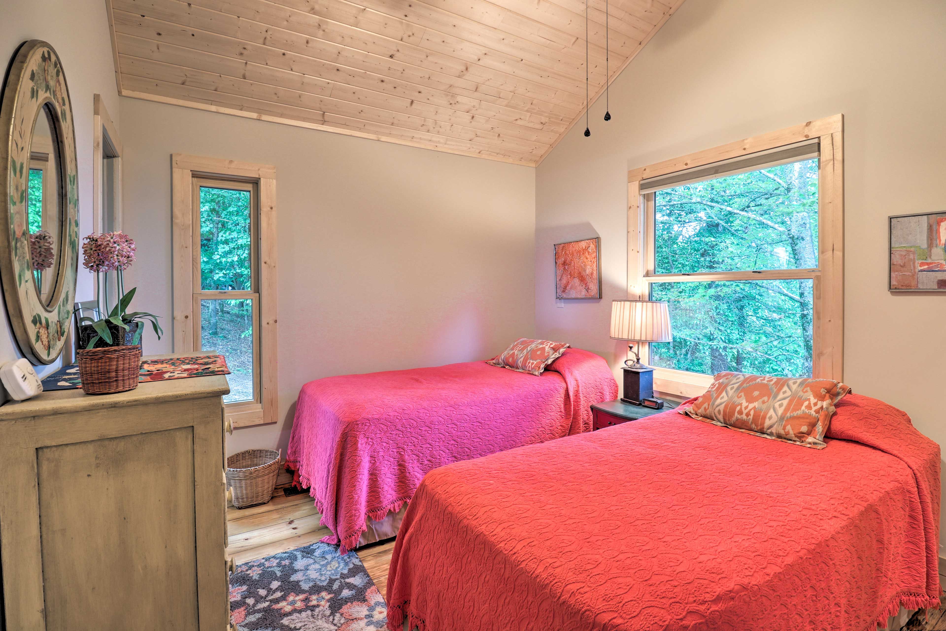 The second bedroom is complete with 2 twin beds.