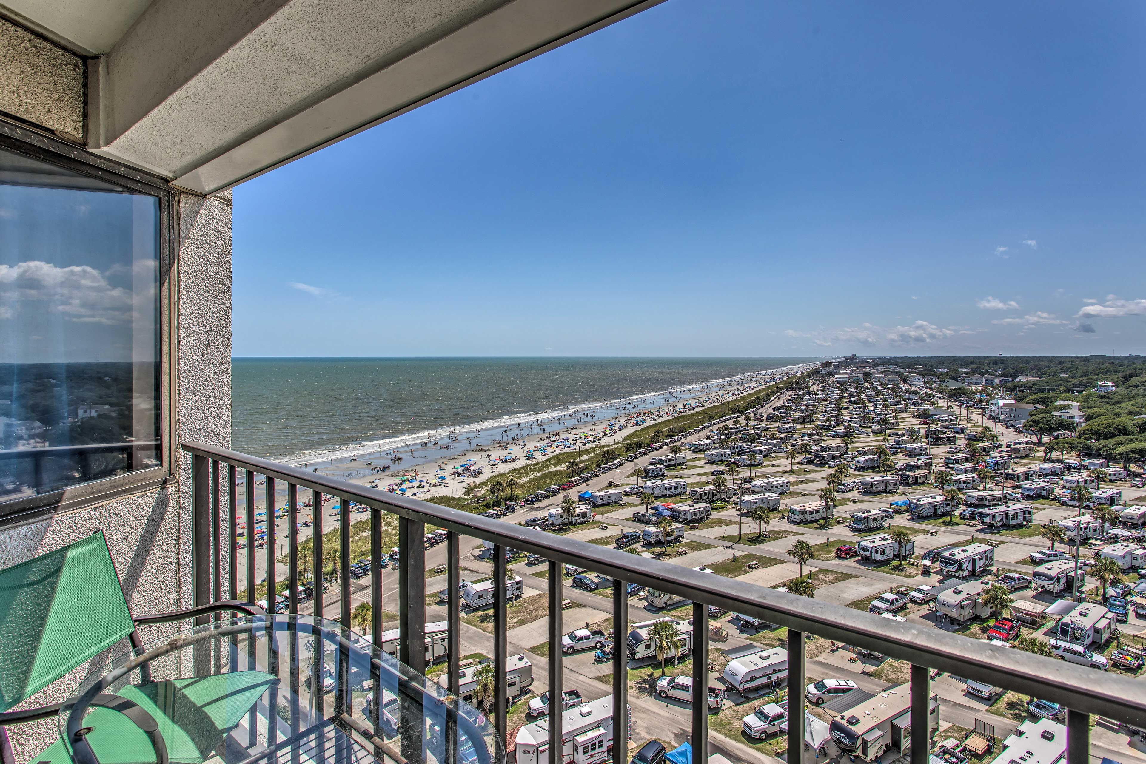 Take in the stunning view of the ocean from the vacation rental's balcony.