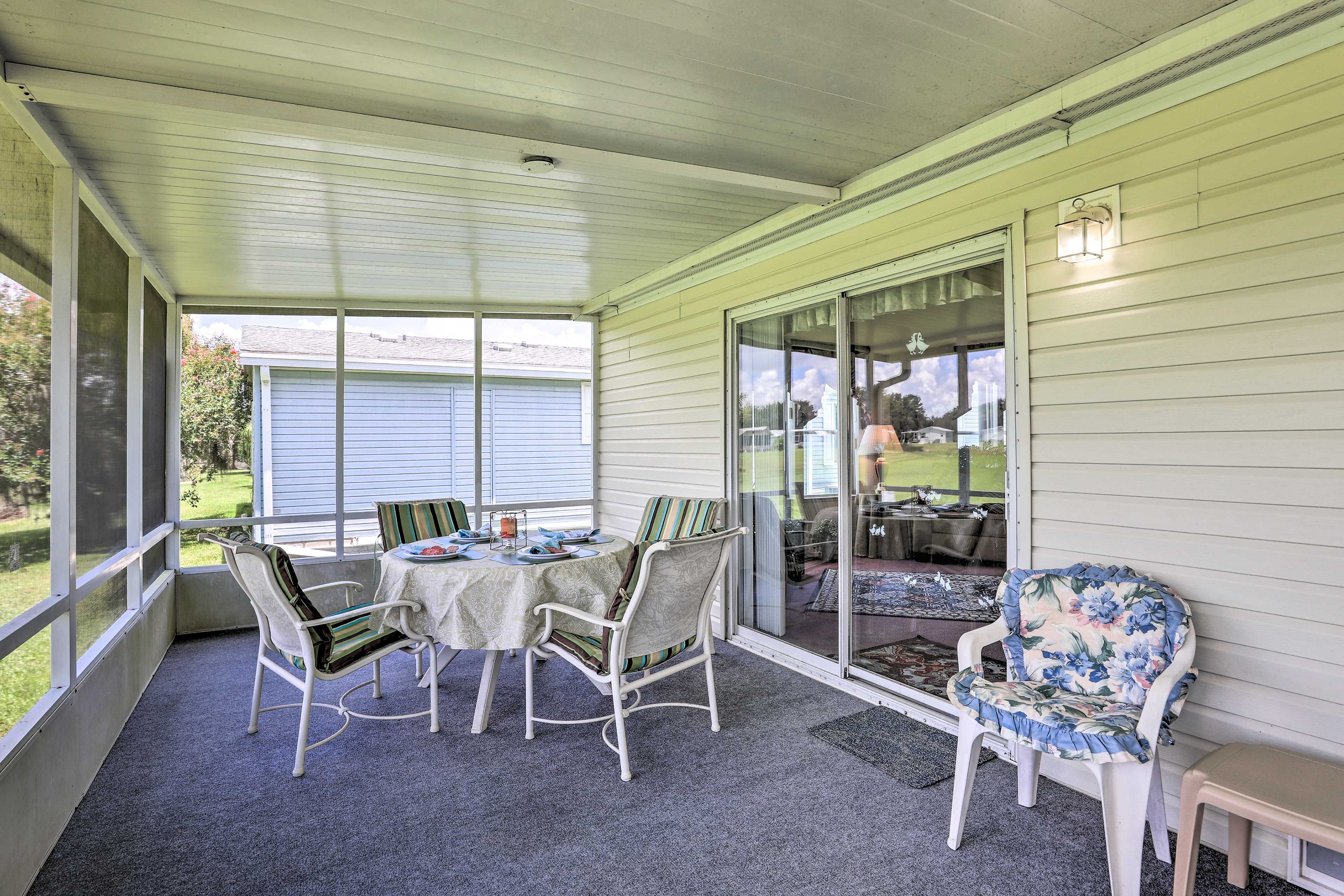 Screened-In Porch | Outdoor Dining Area
