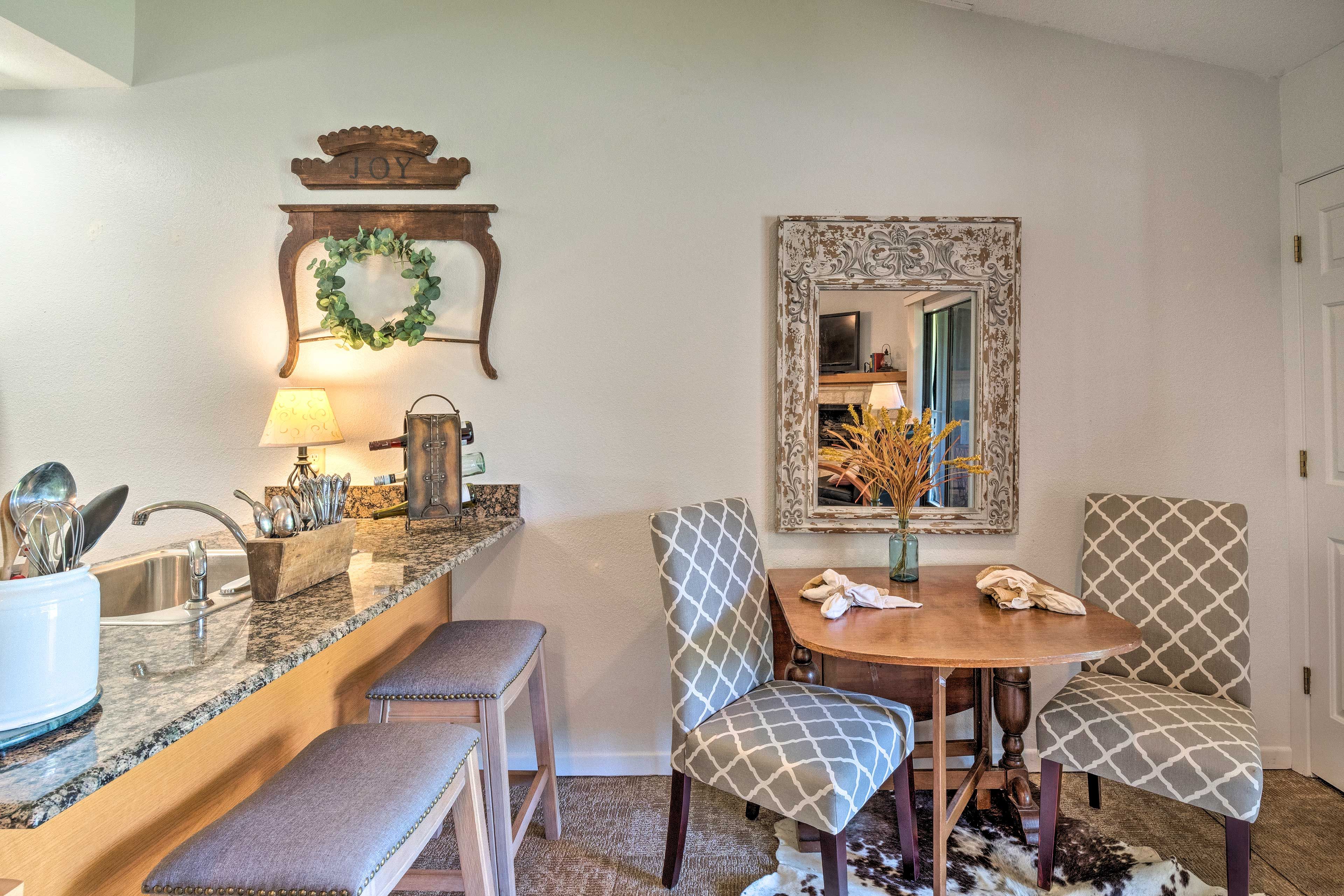 Sit at the 2-person table or breakfast bar for snacks.