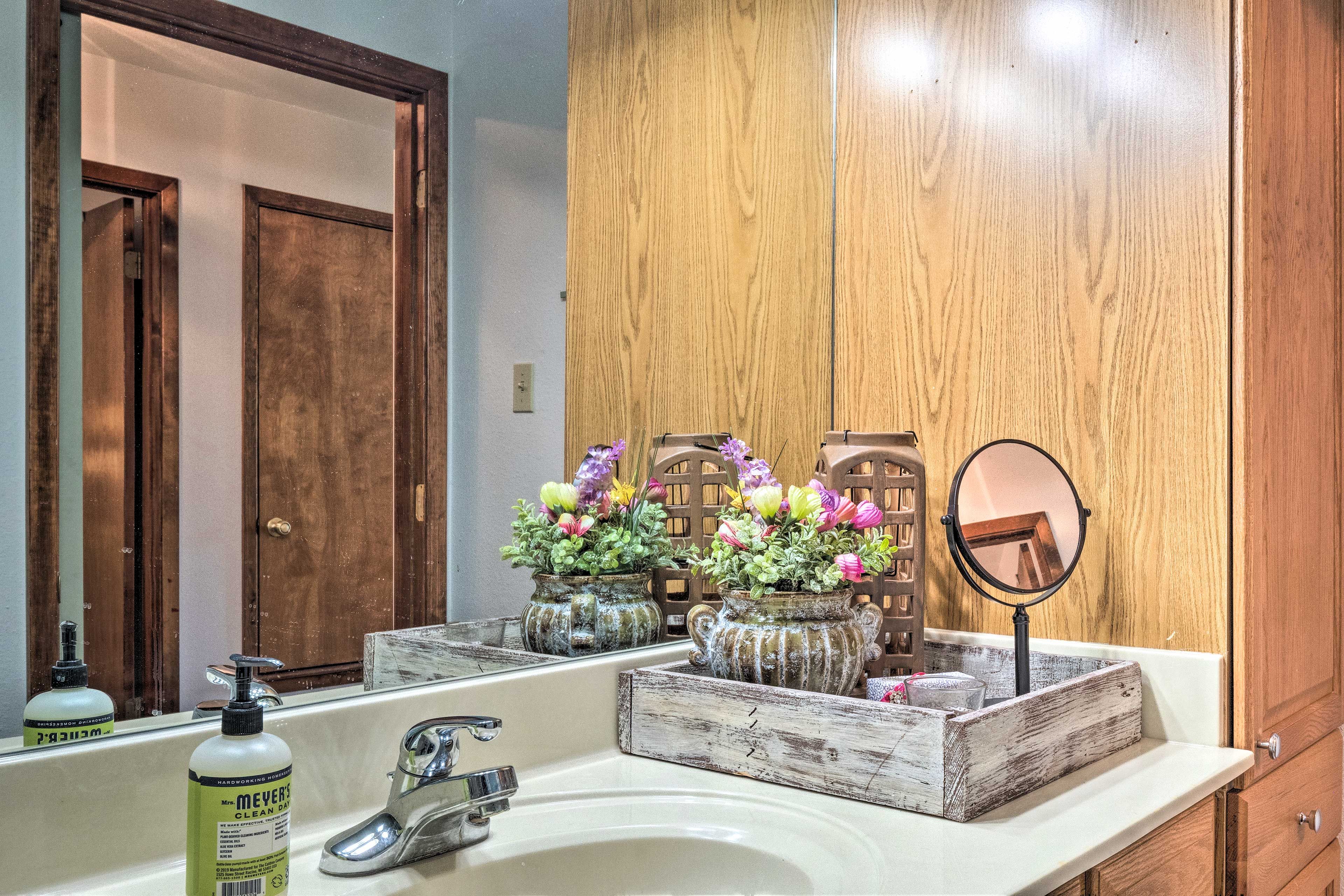 Wash up using organic soaps or use the magnified mirror to apply makeup.