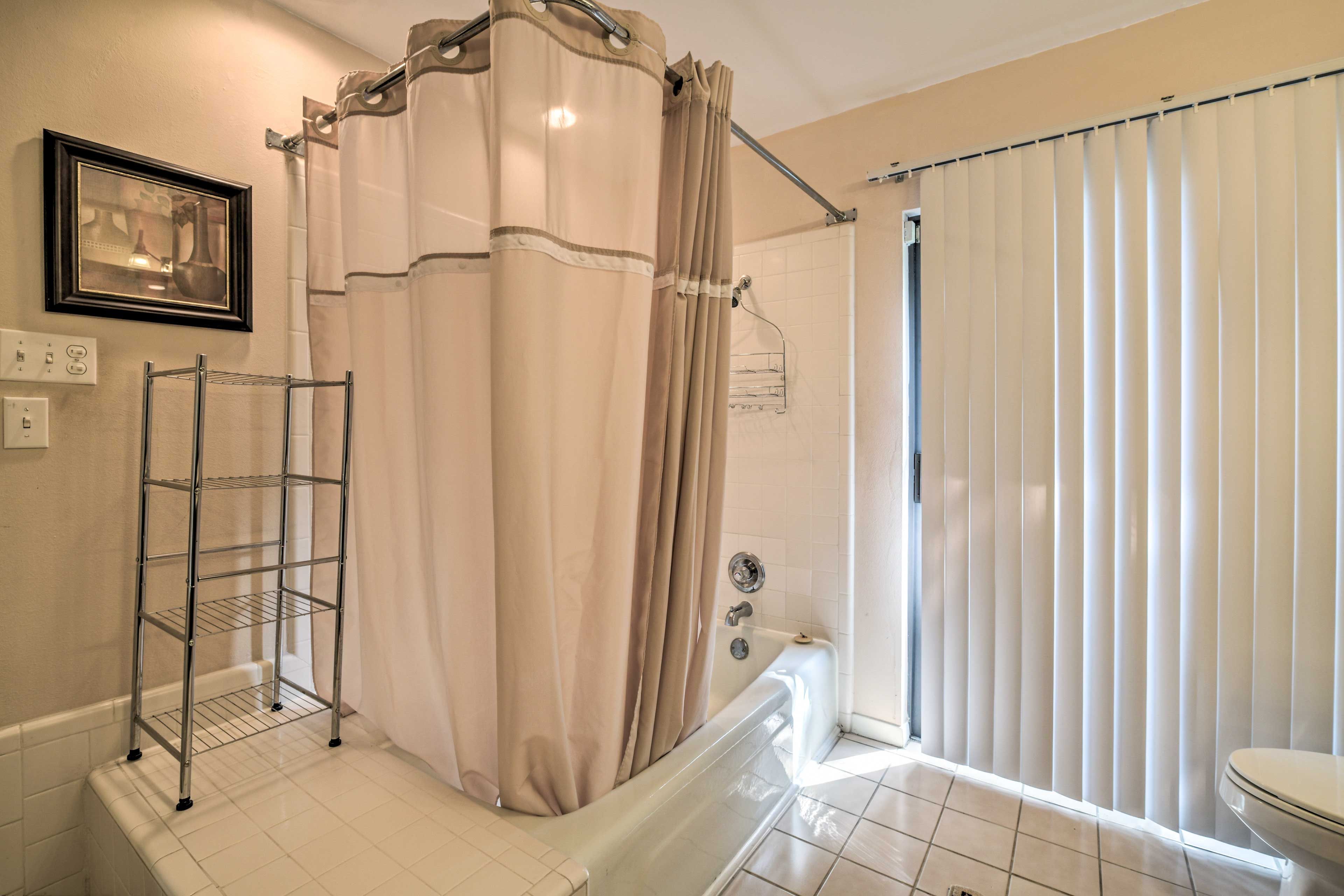Take a shower or a bath in this full bathroom.