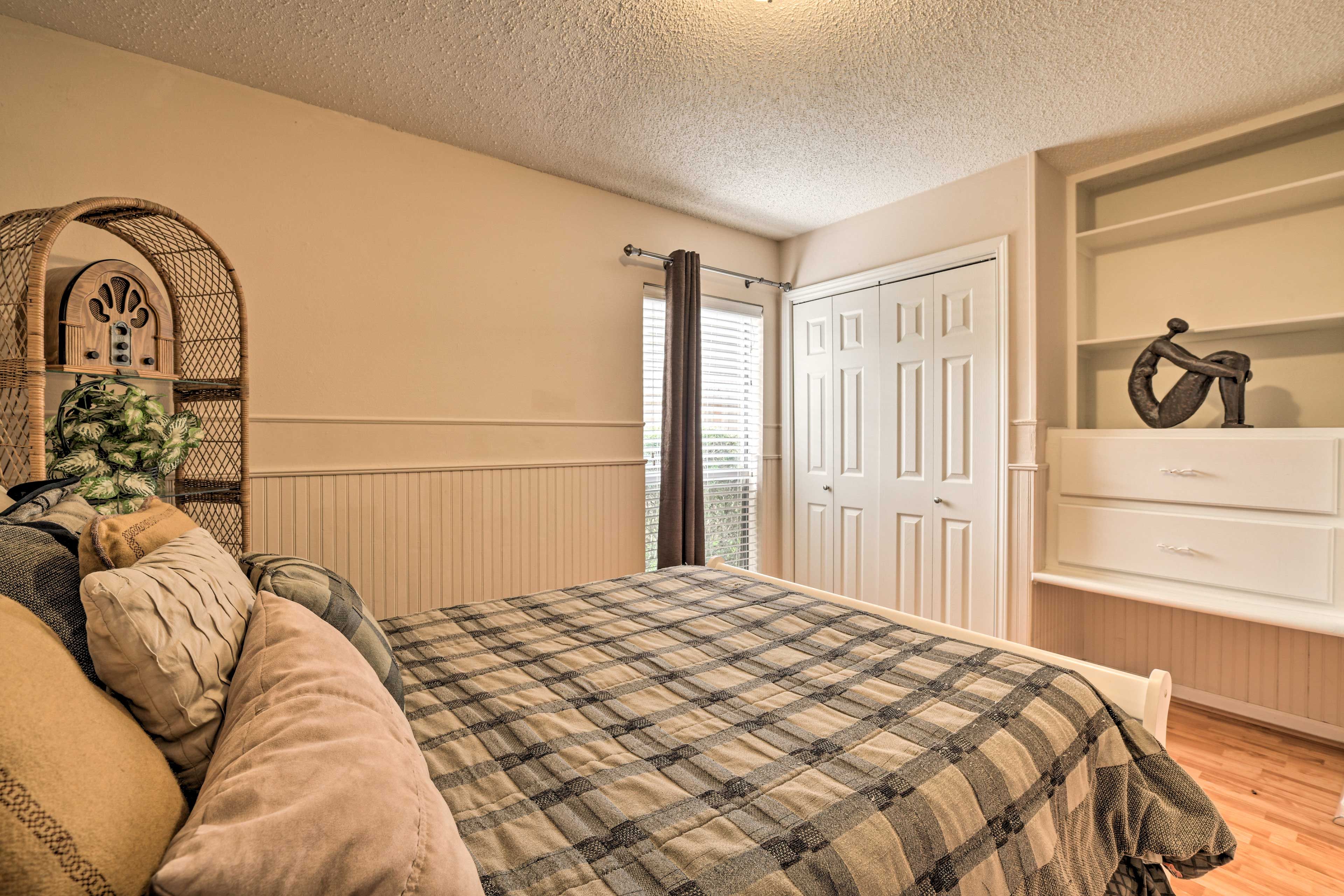 The second bedroom hosts a full-sized bed.