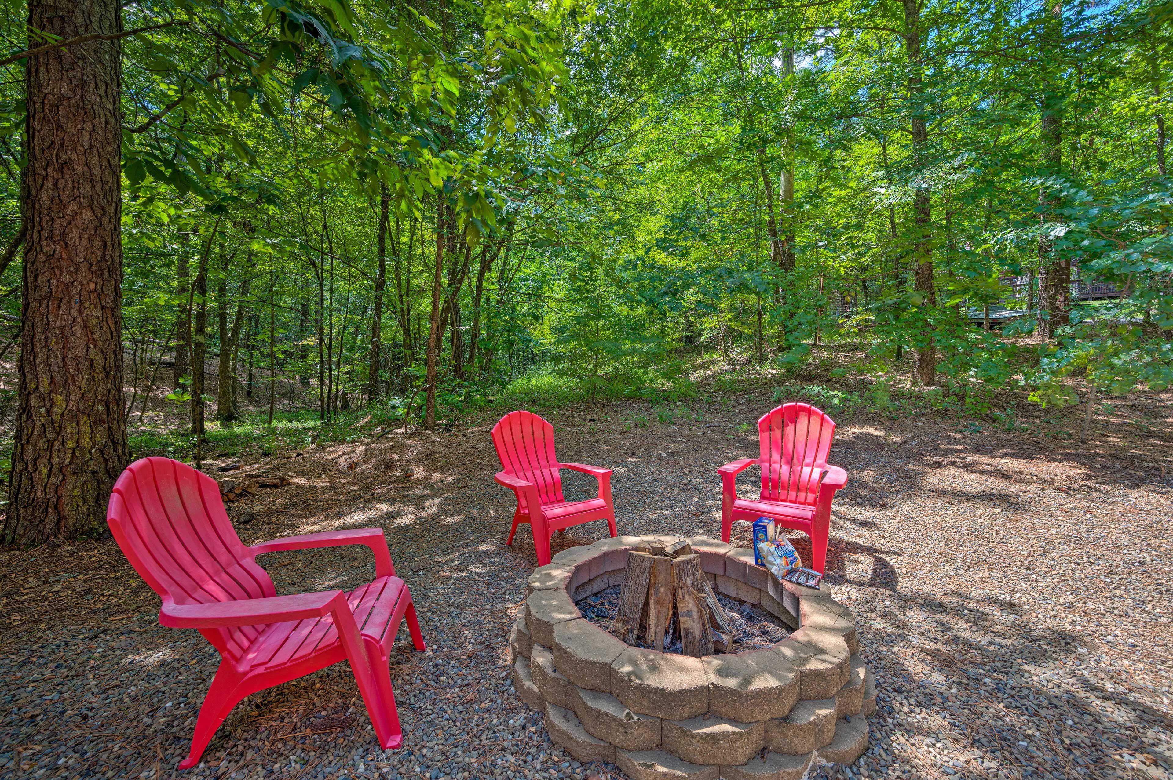 Gather around the fire pit and listen to the cicadas in the forest.