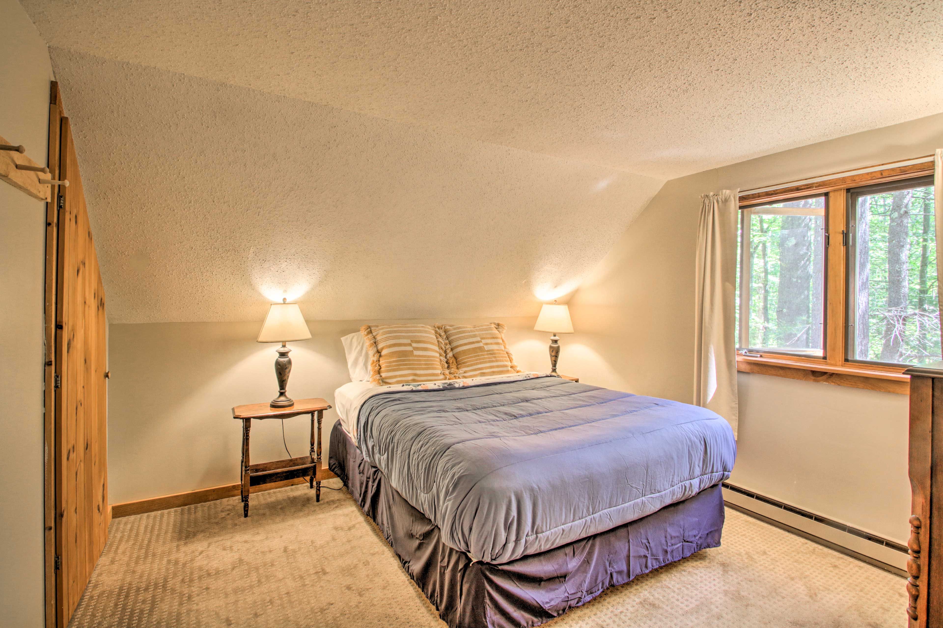 Flip through a new book with 2 bedside lamps.