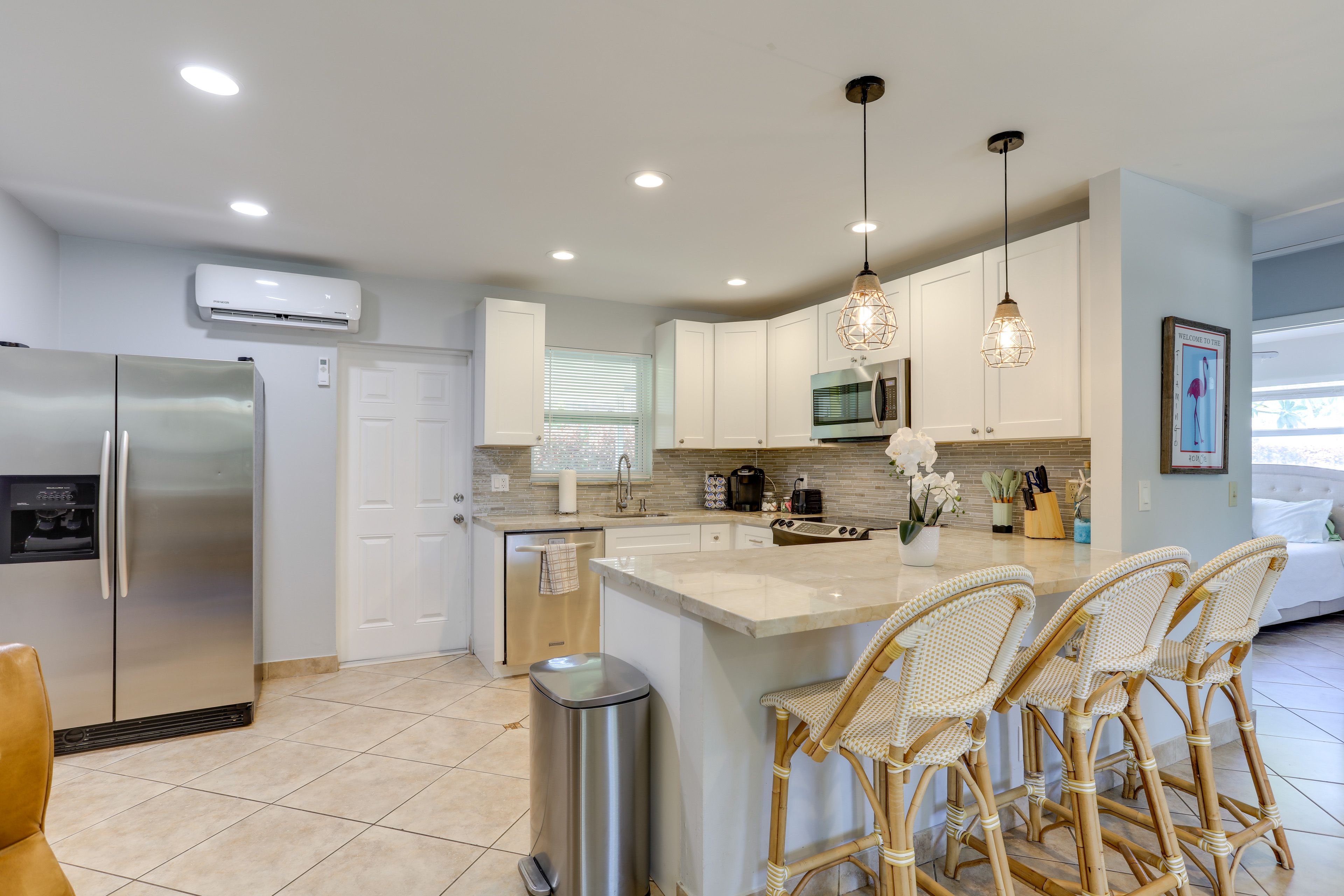 Breakfast Bar Dining Area | Dishes & Flatware Provided