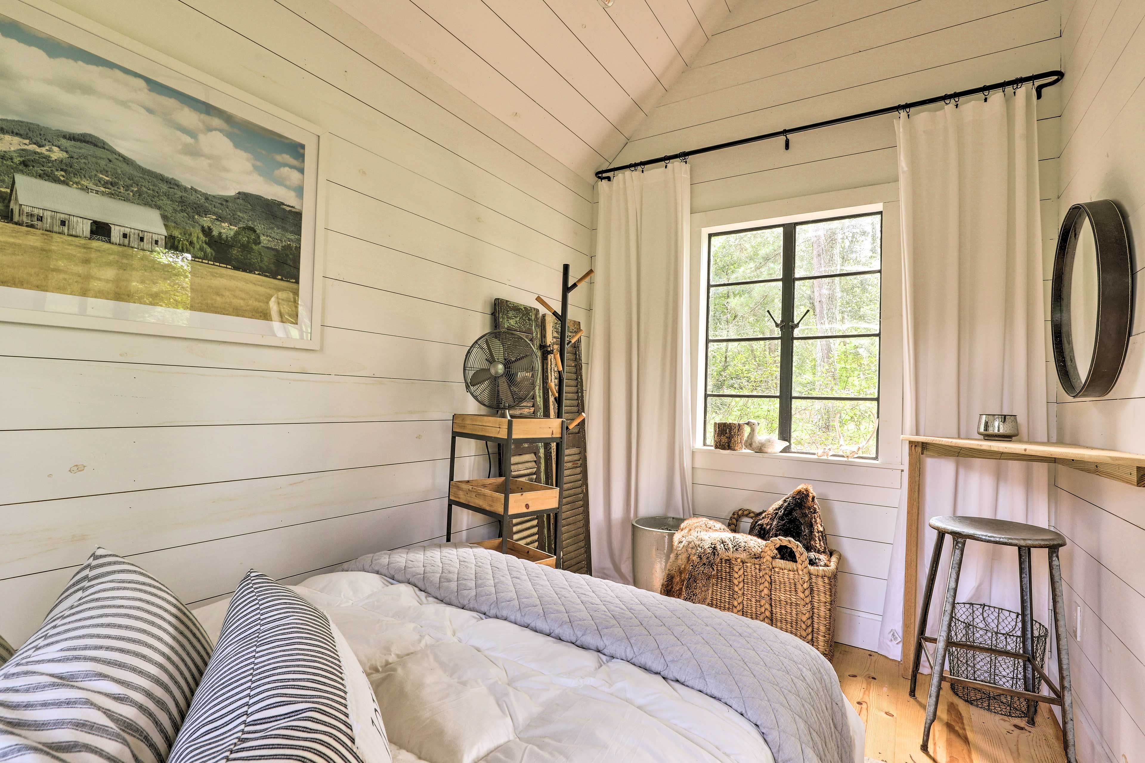 Rise and shine to natural sunlight brightening the bedroom.