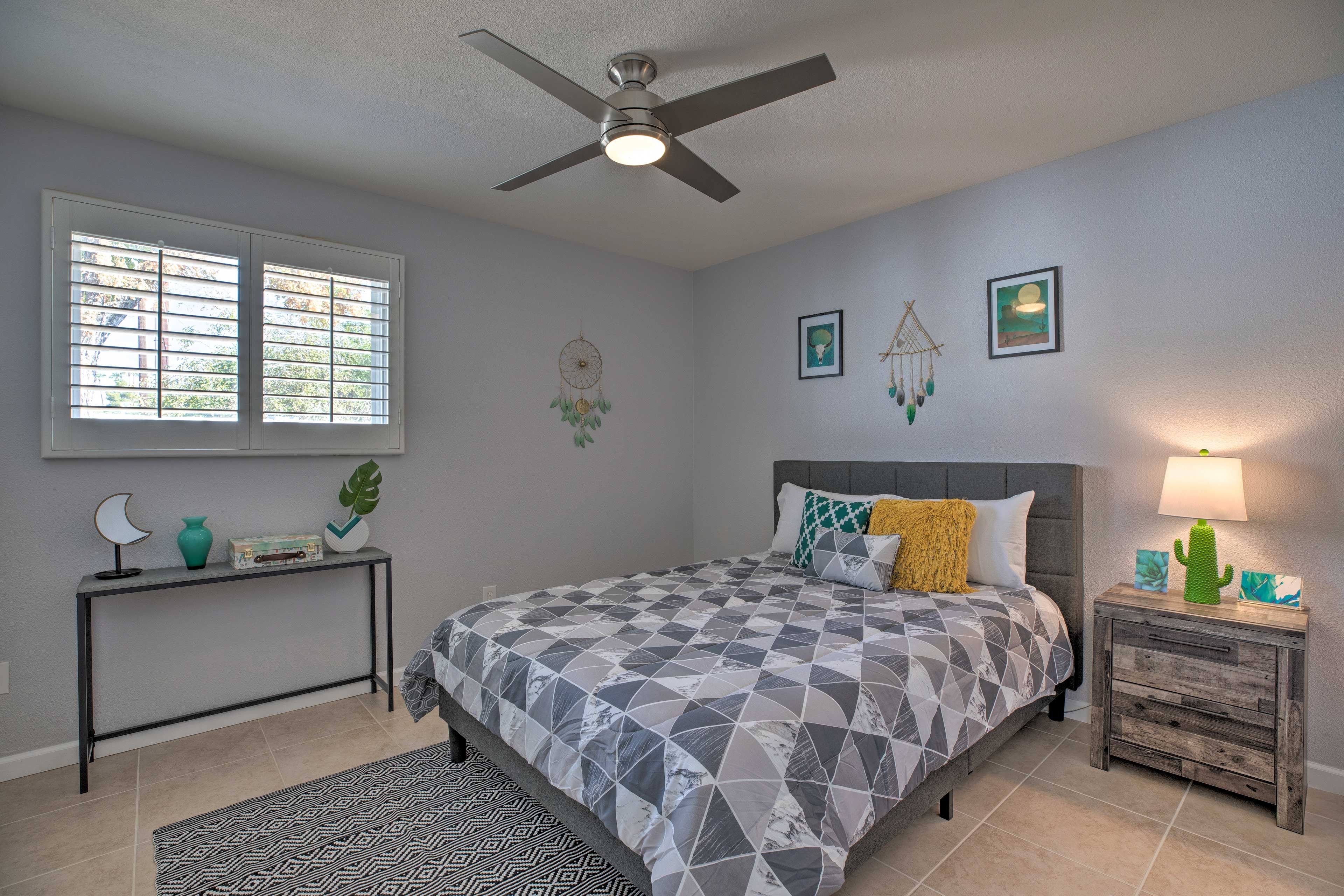 The second bedroom has a queen bed for 2 guests.