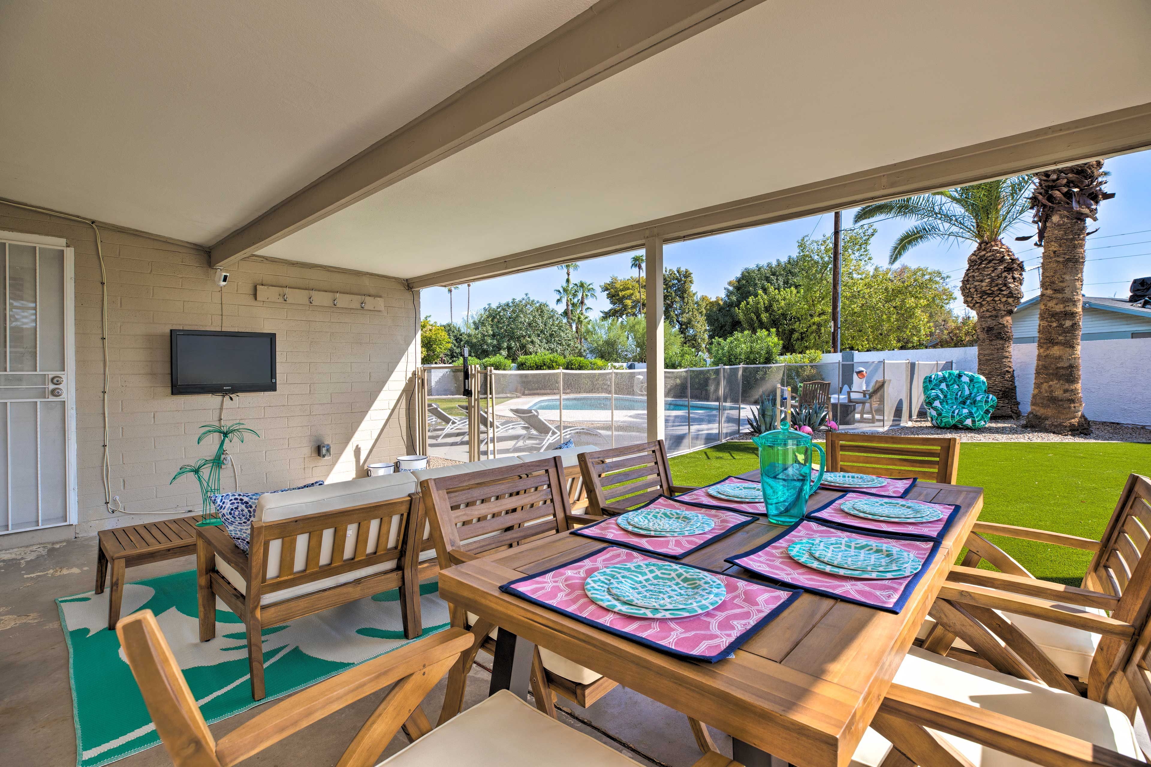 Unwind on the covered deck and watch TV while you're not in the private pool!