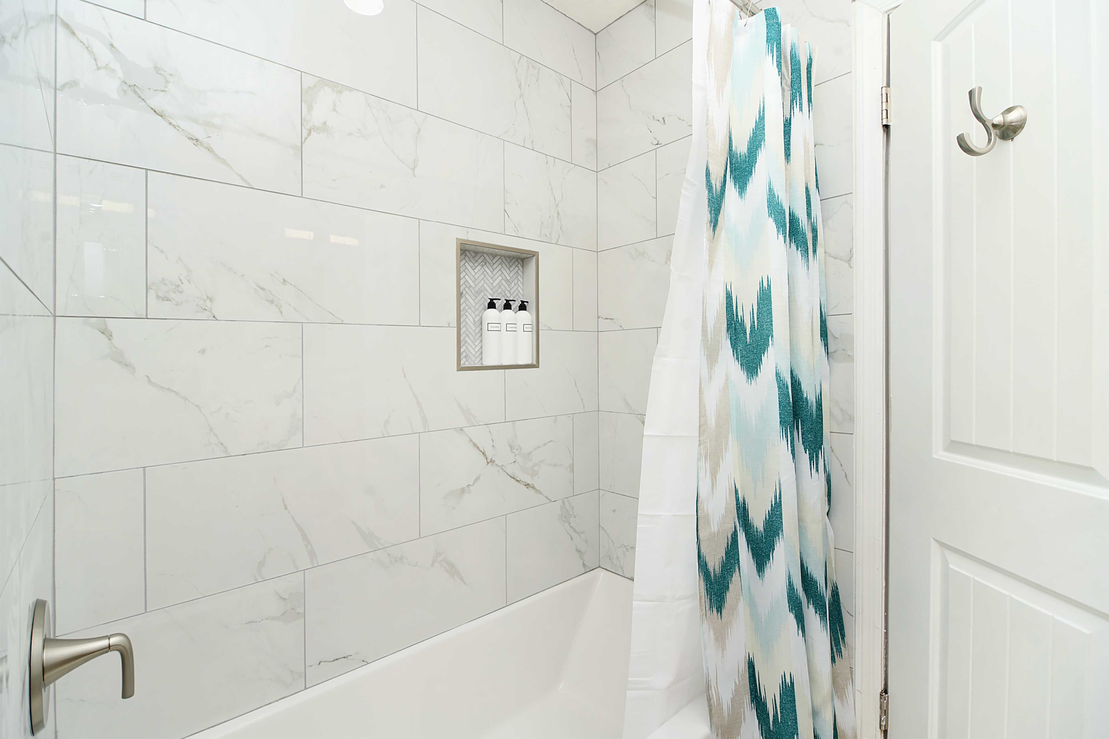 The space features a tub/shower combo.