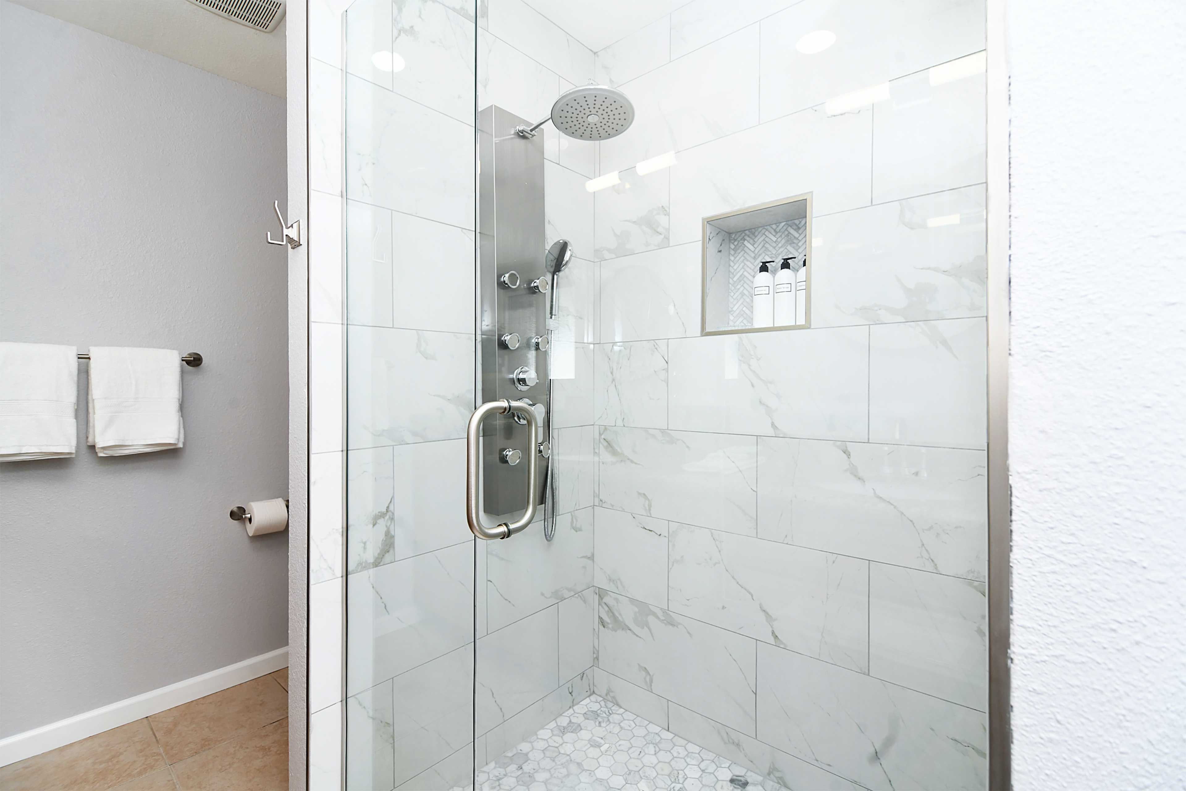 Unwind below the rainfall-style showerhead.