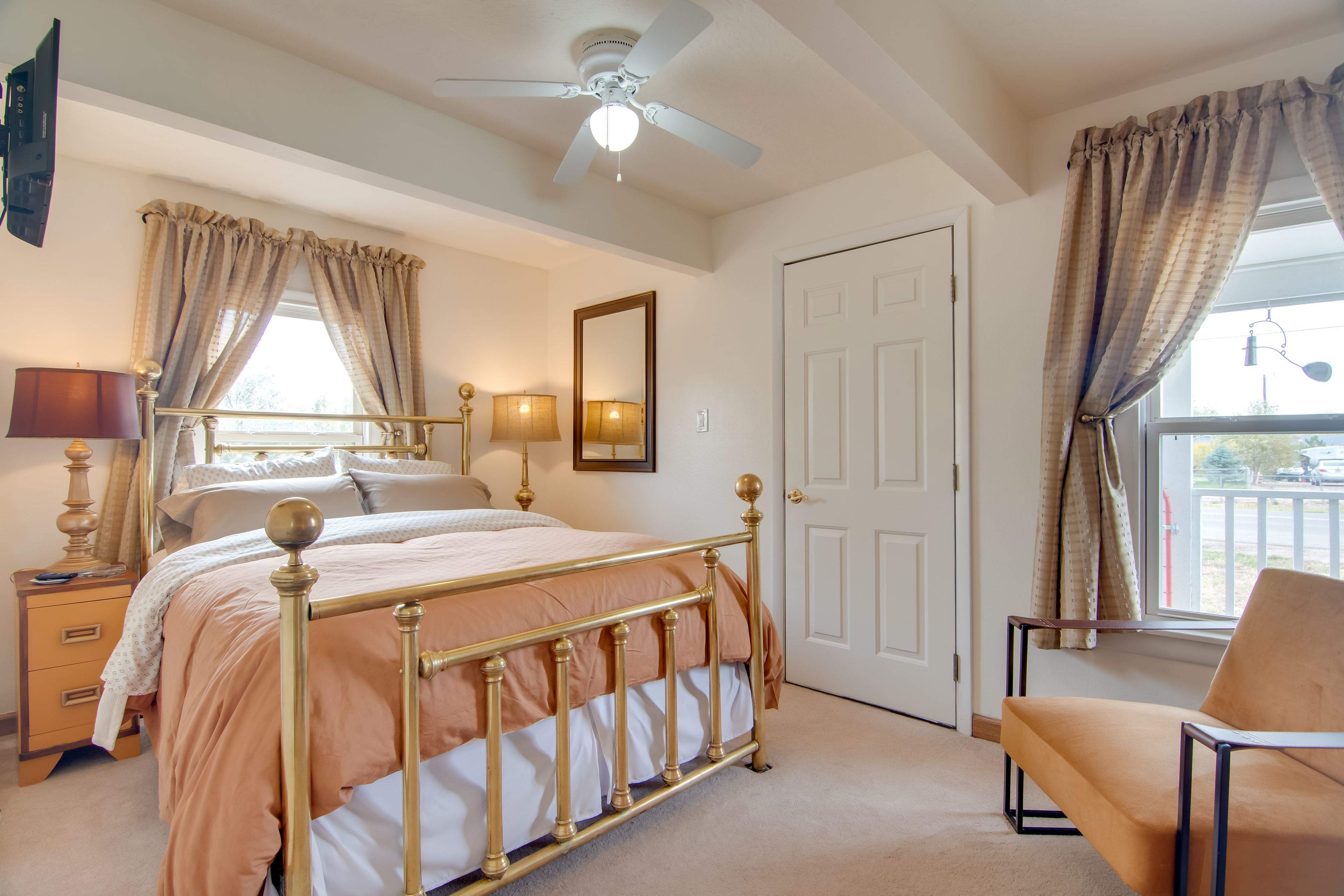 Queen Bed | Porch Access | Flat-Screen TV | Linens Provided
