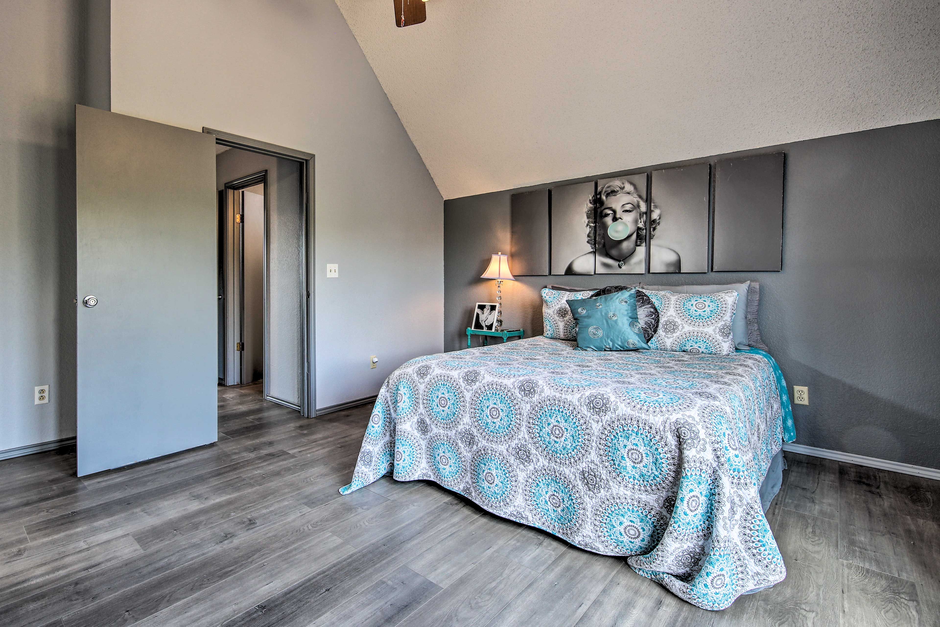 The master suite boasts an infamous photo of the one and only Marilyn Monroe.