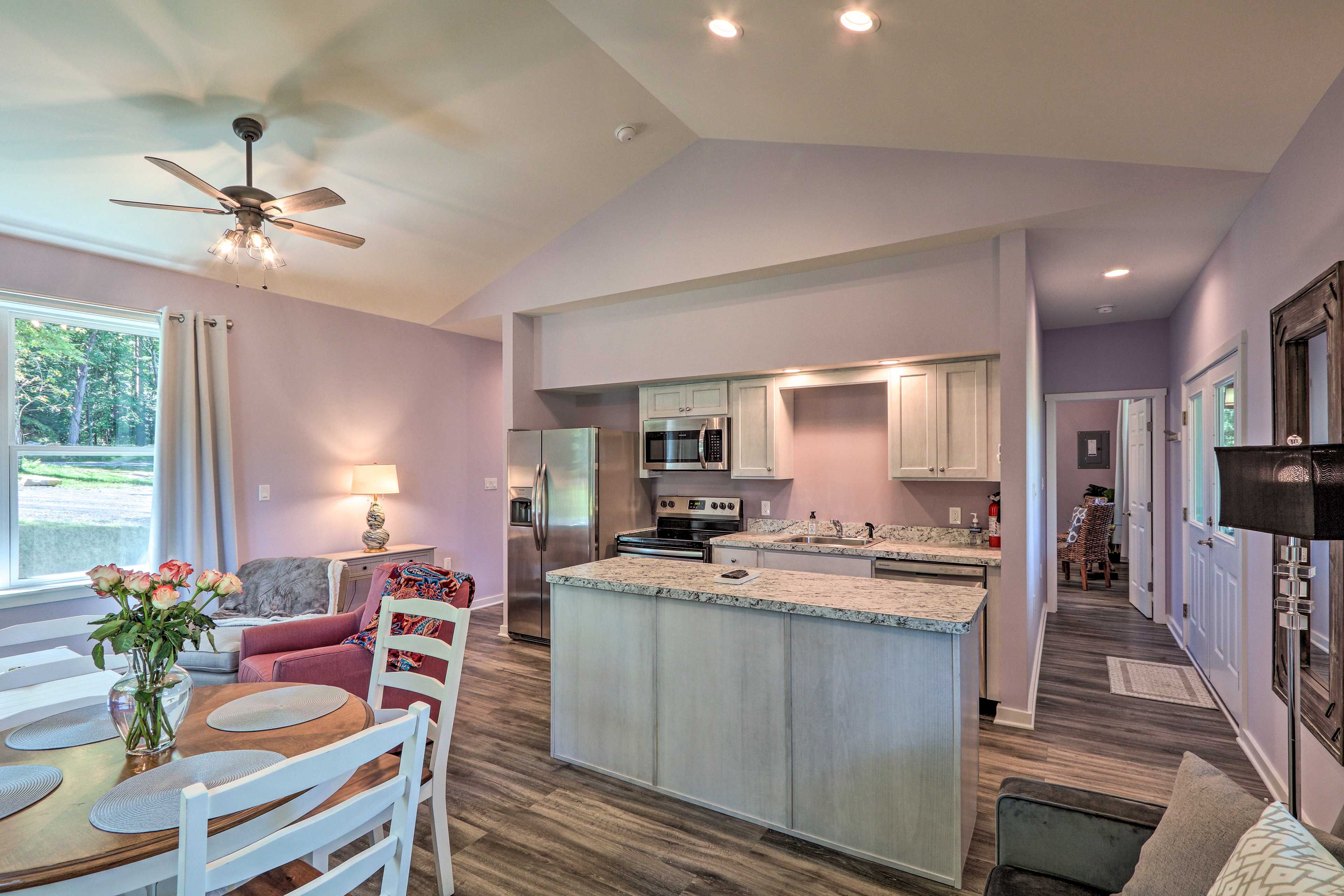 The kitchen comes fully equipped with stainless steel appliances.