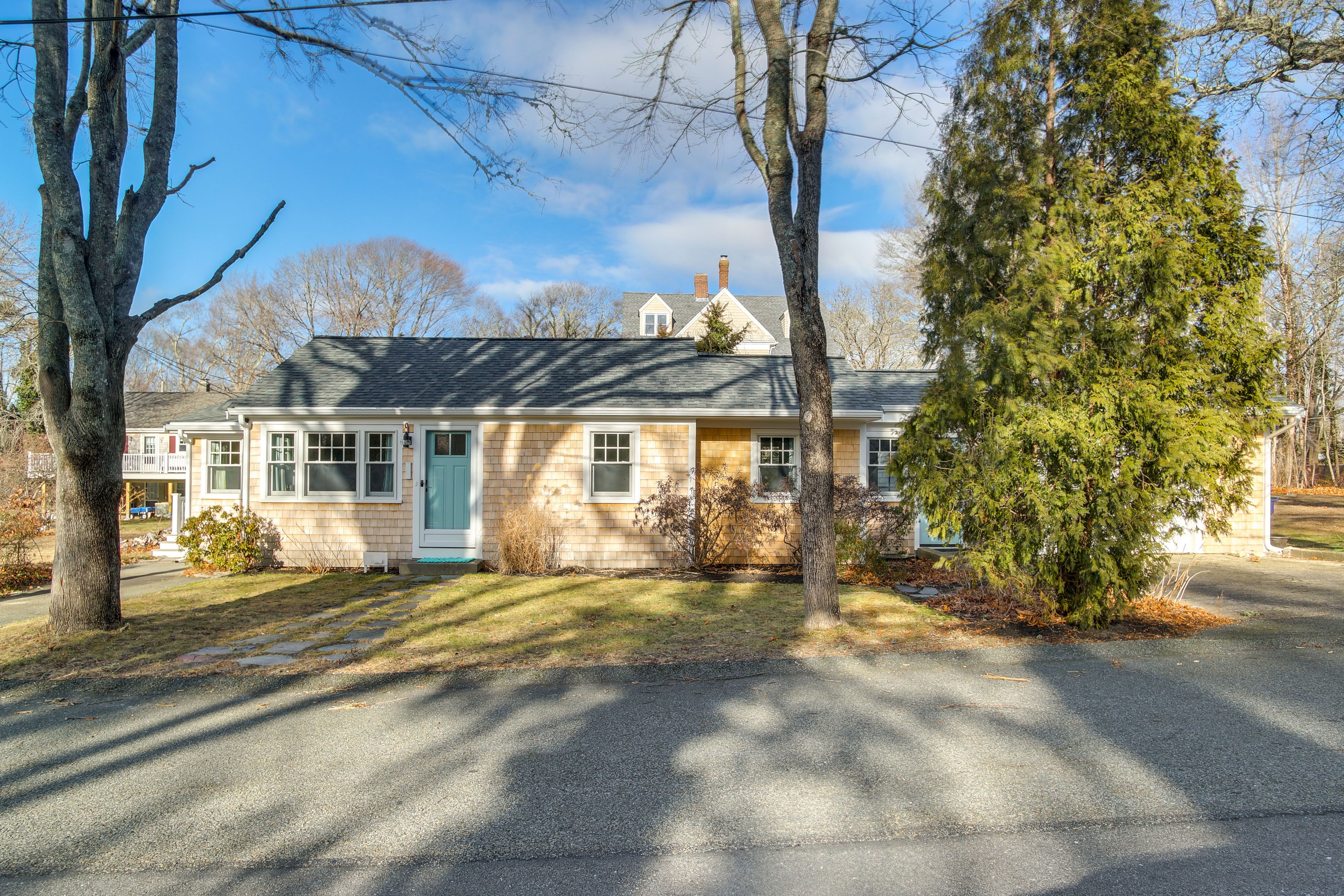 Cottage Exterior | Walk to Monument Beach