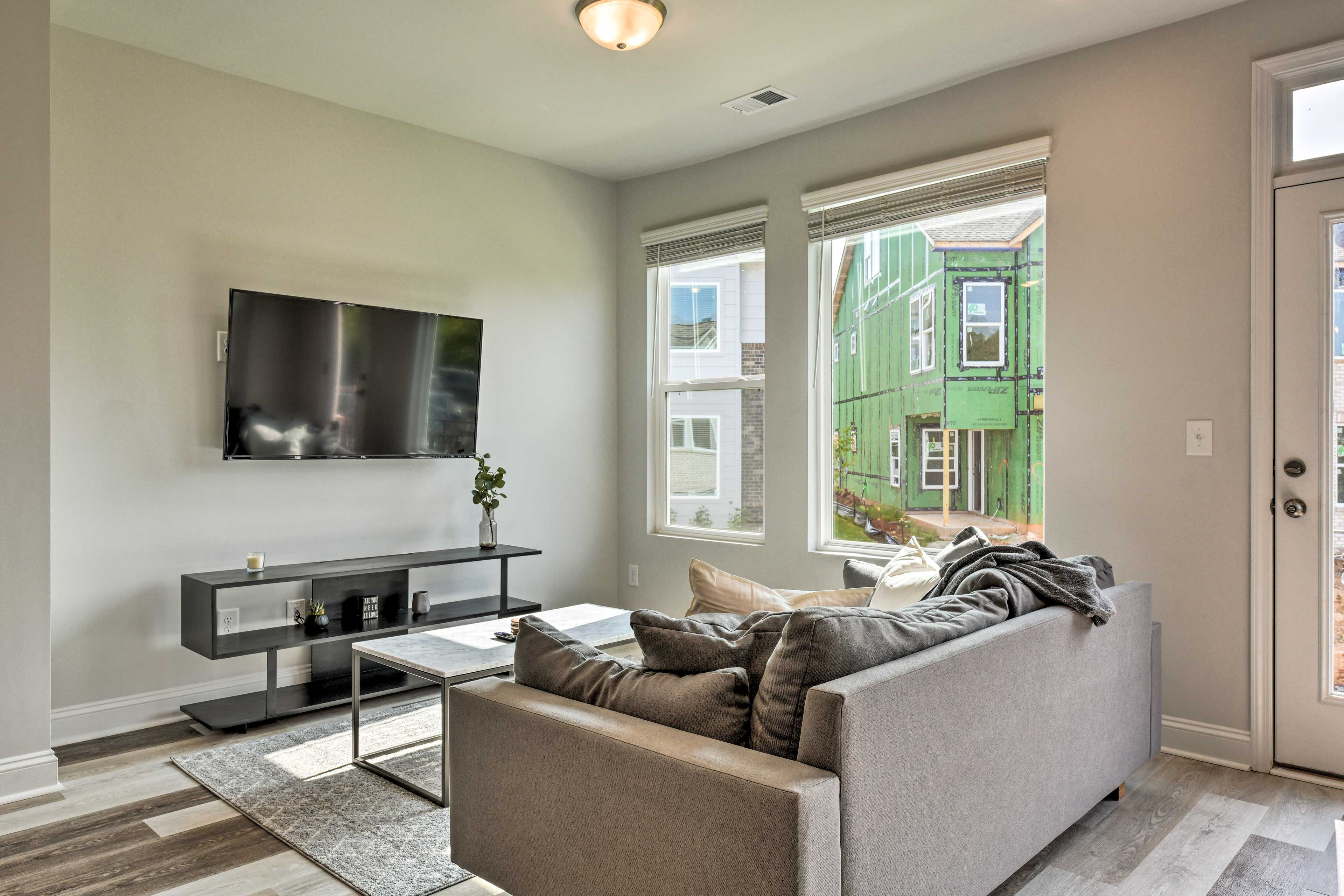 Kick your feet up and enjoy your favorite movies on the flat-screen cable TV.