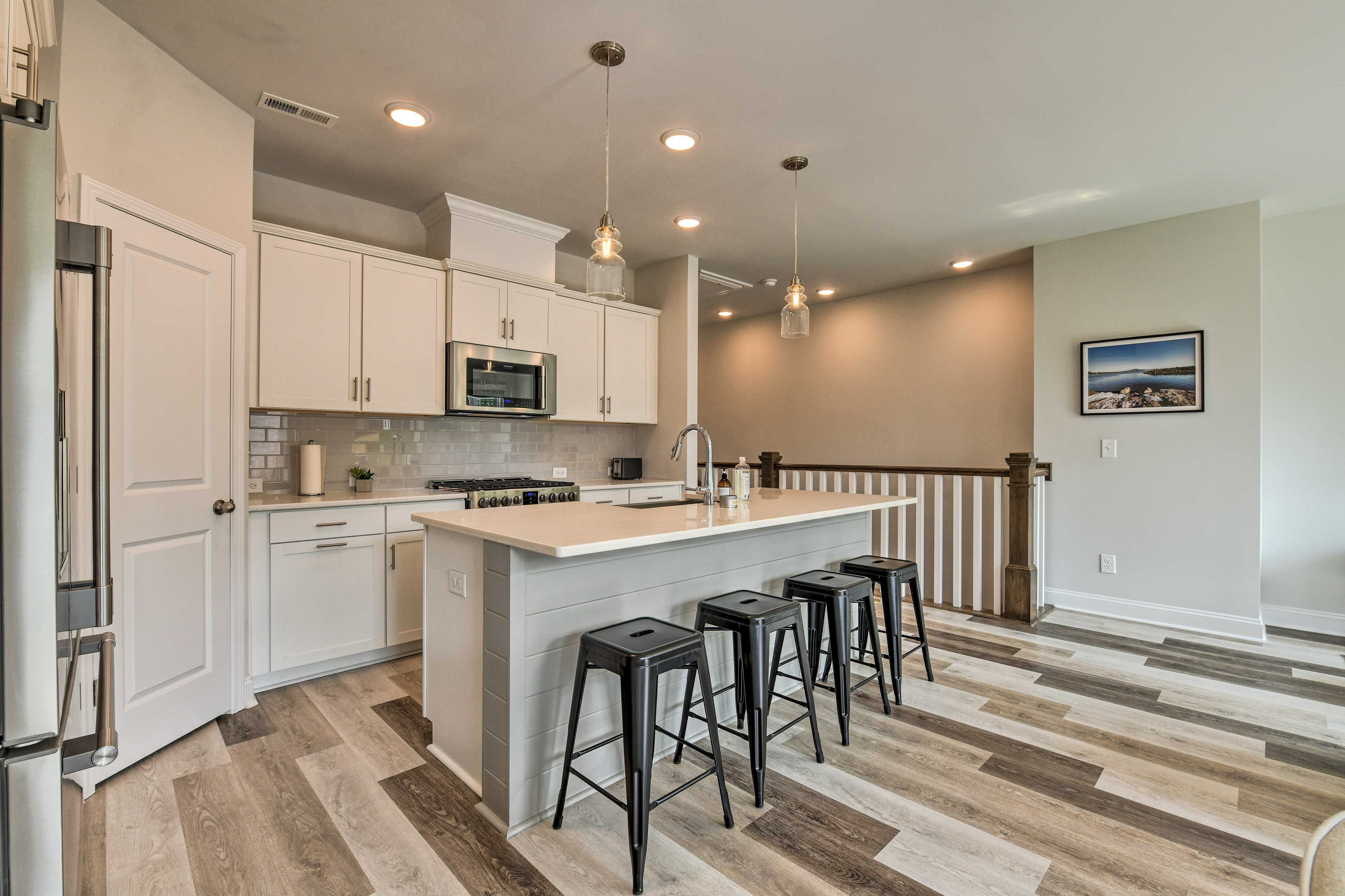 Grab a quick snack at the large island with seating for 4.