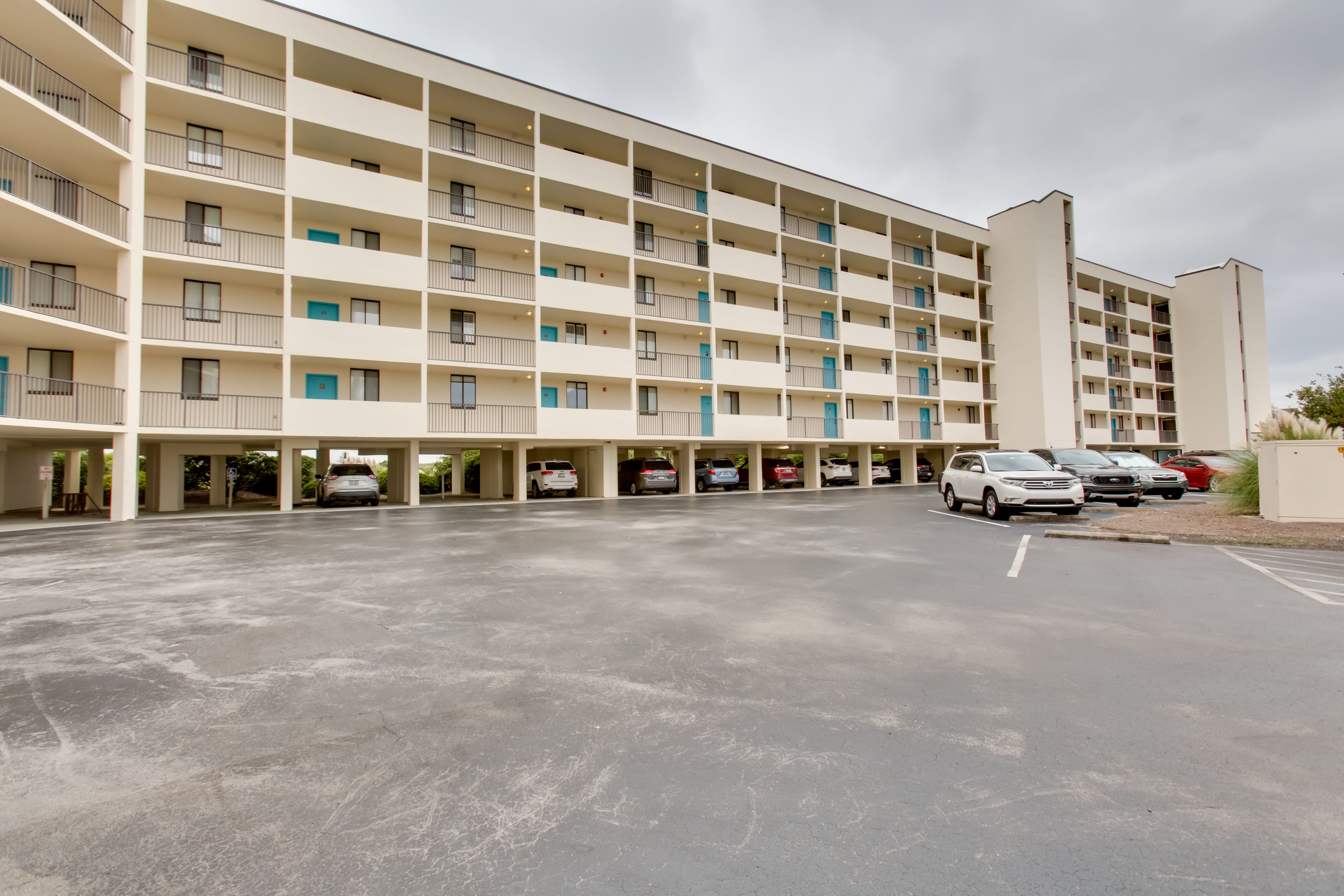 Condo Exterior | Open Parking Lot