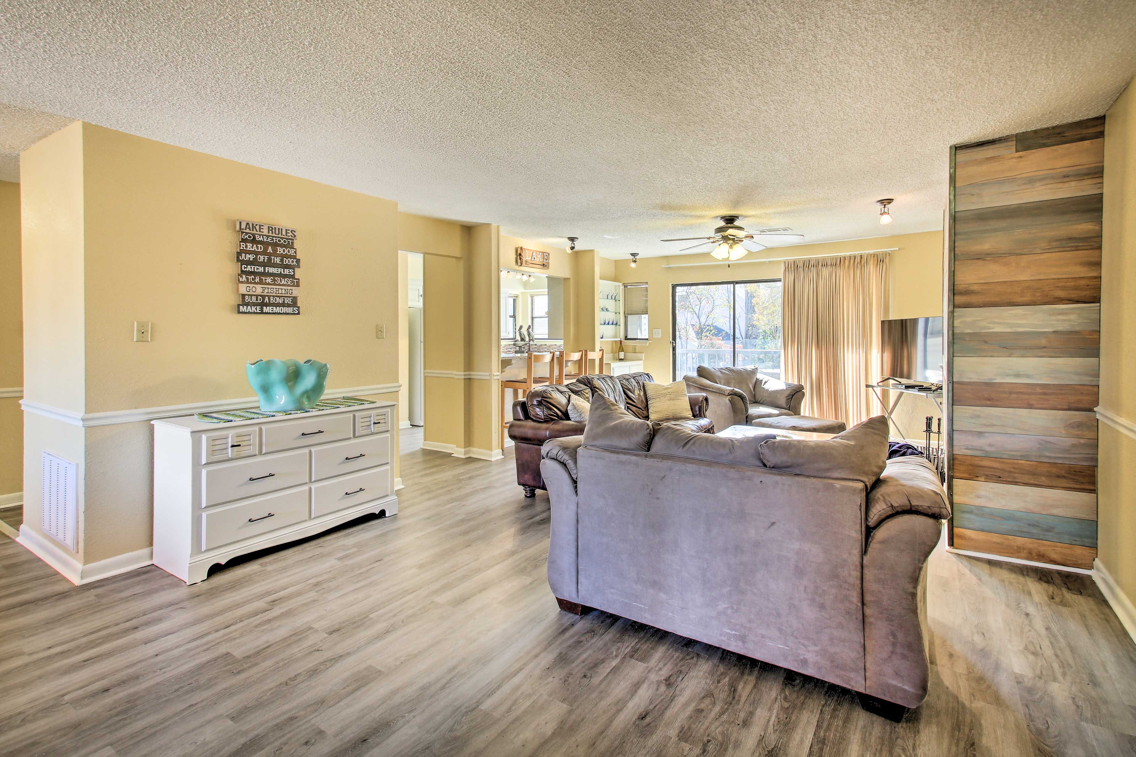 Living Room | Wood-Burning Fireplace | Balcony Access