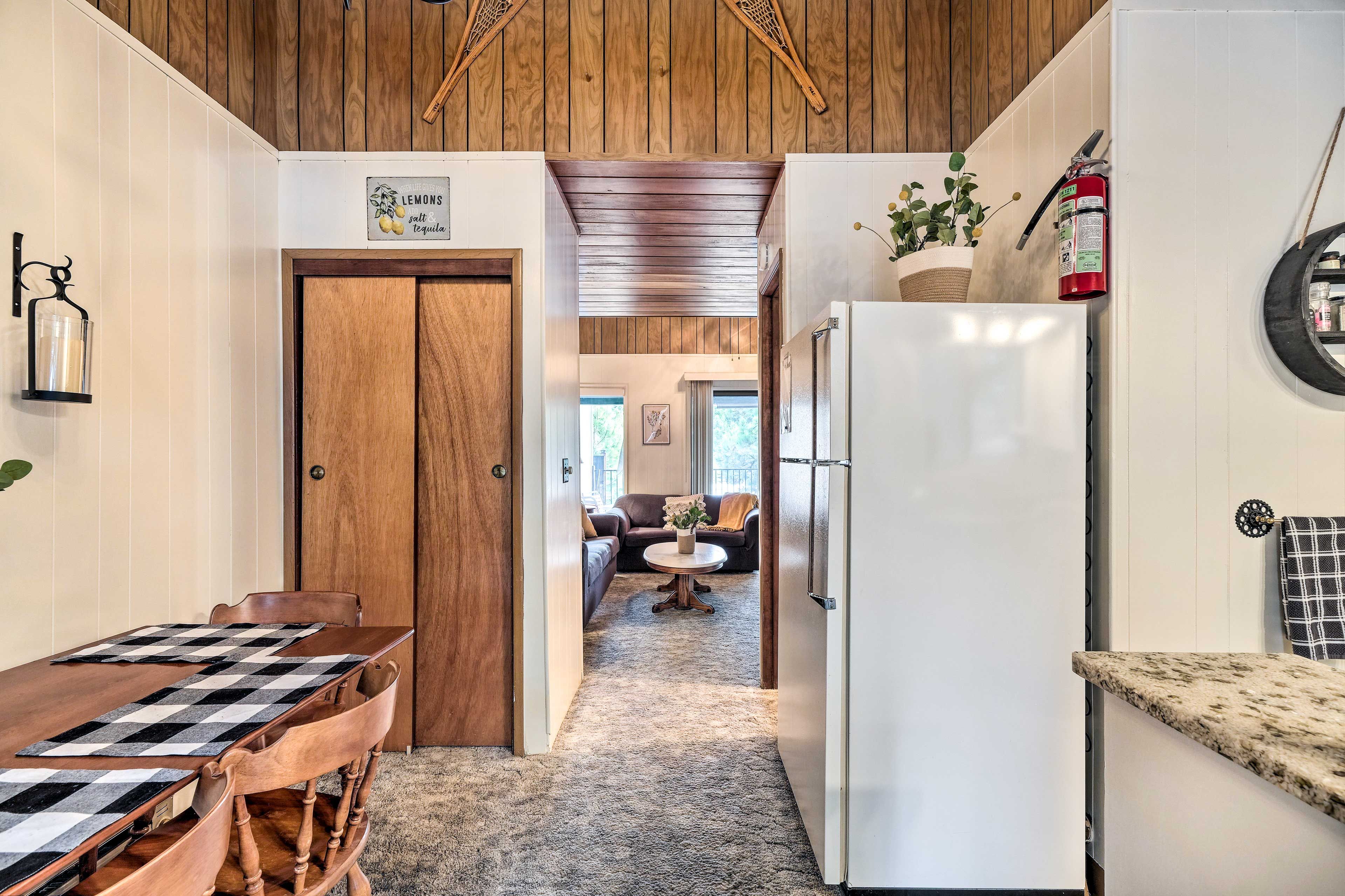 Condo Entrance | Kitchen & Dining Area | Wall Heaters