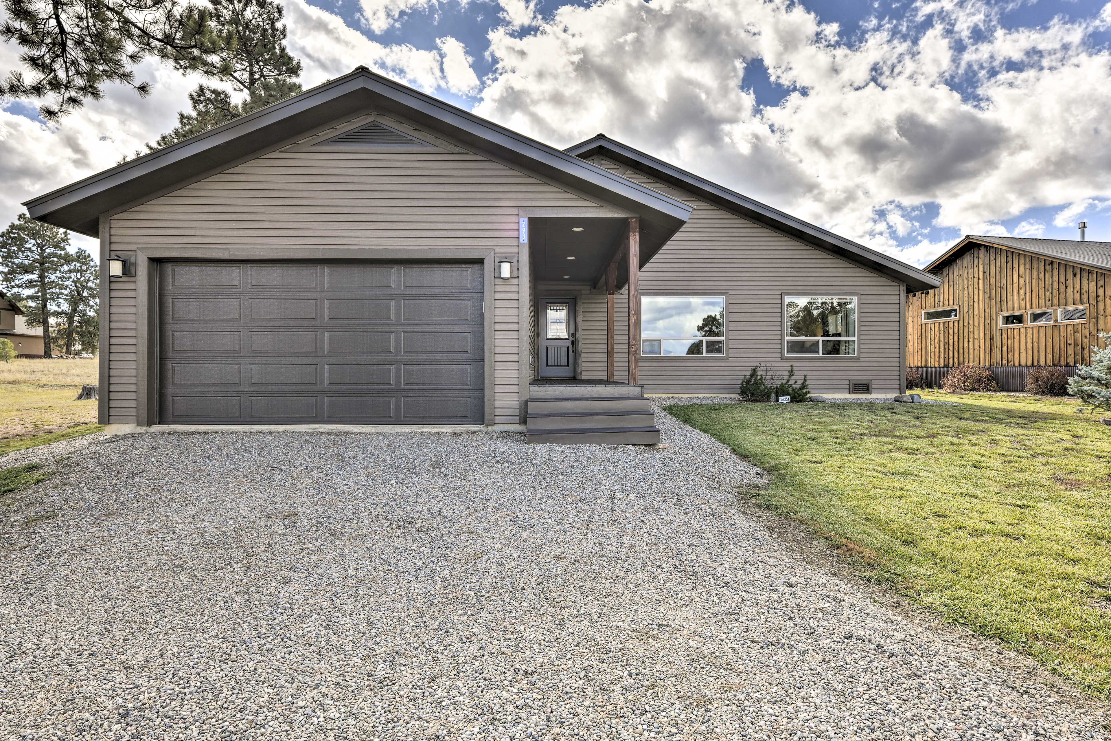 Exterior | Garage & Driveway Parking