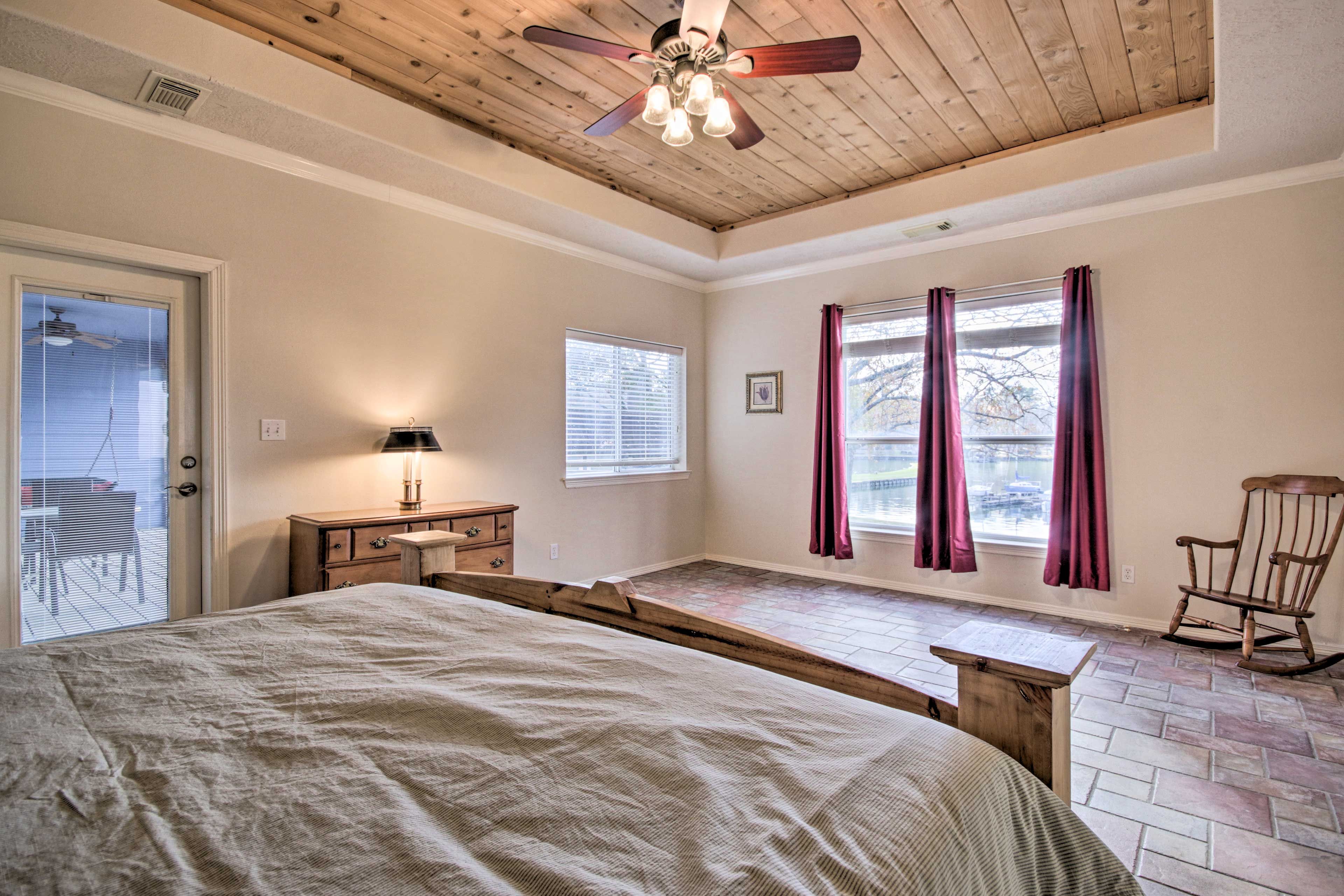 Bedroom 1 | Screened-In Porch Access | Lake Views