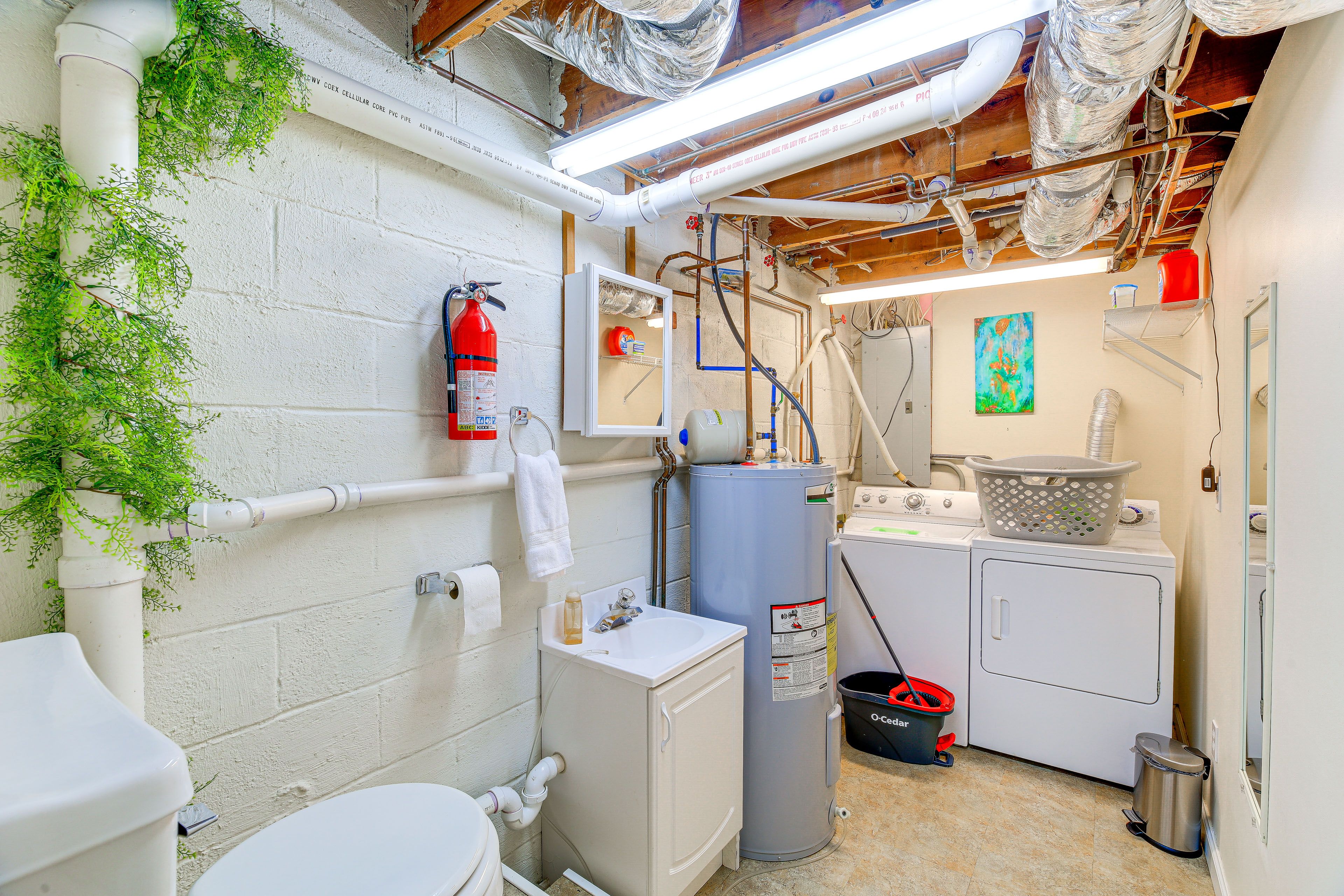 Laundry Room | Half Bathroom | 1st Floor