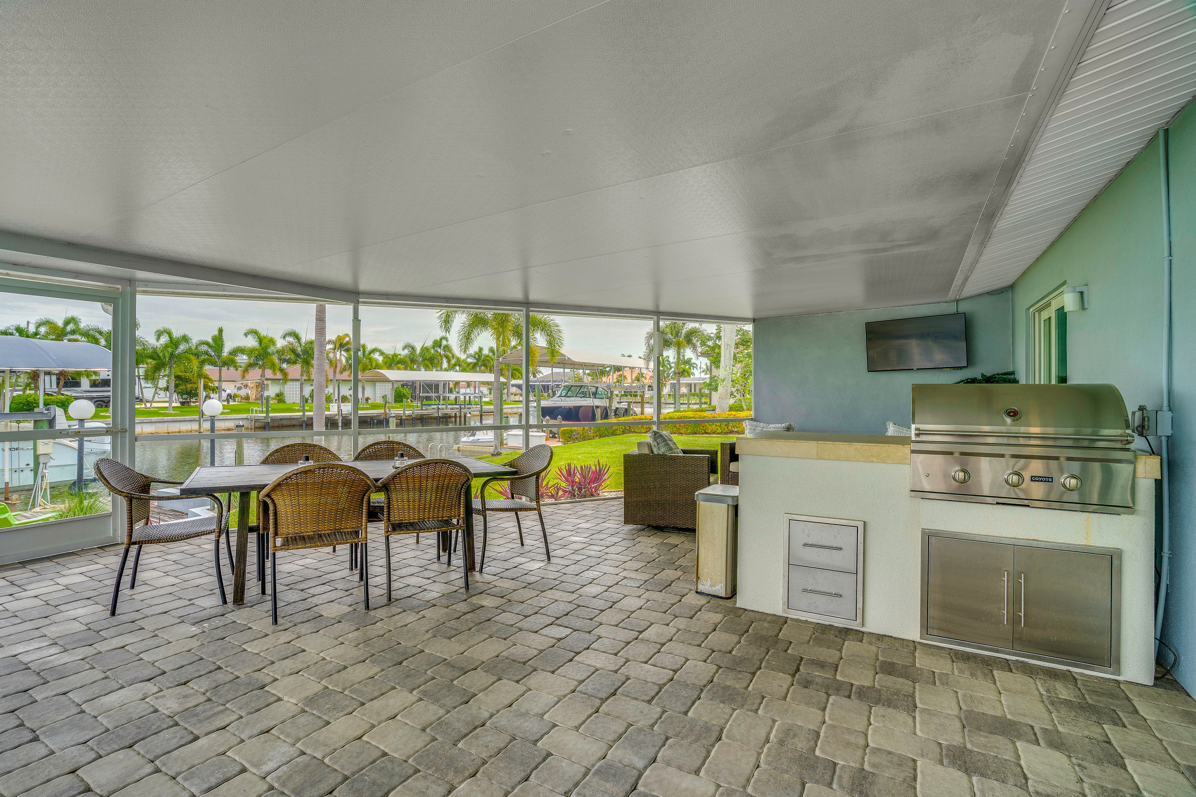 Covered Patio | Gas Grill | Lounge Area w/ TV | Outdoor Dining