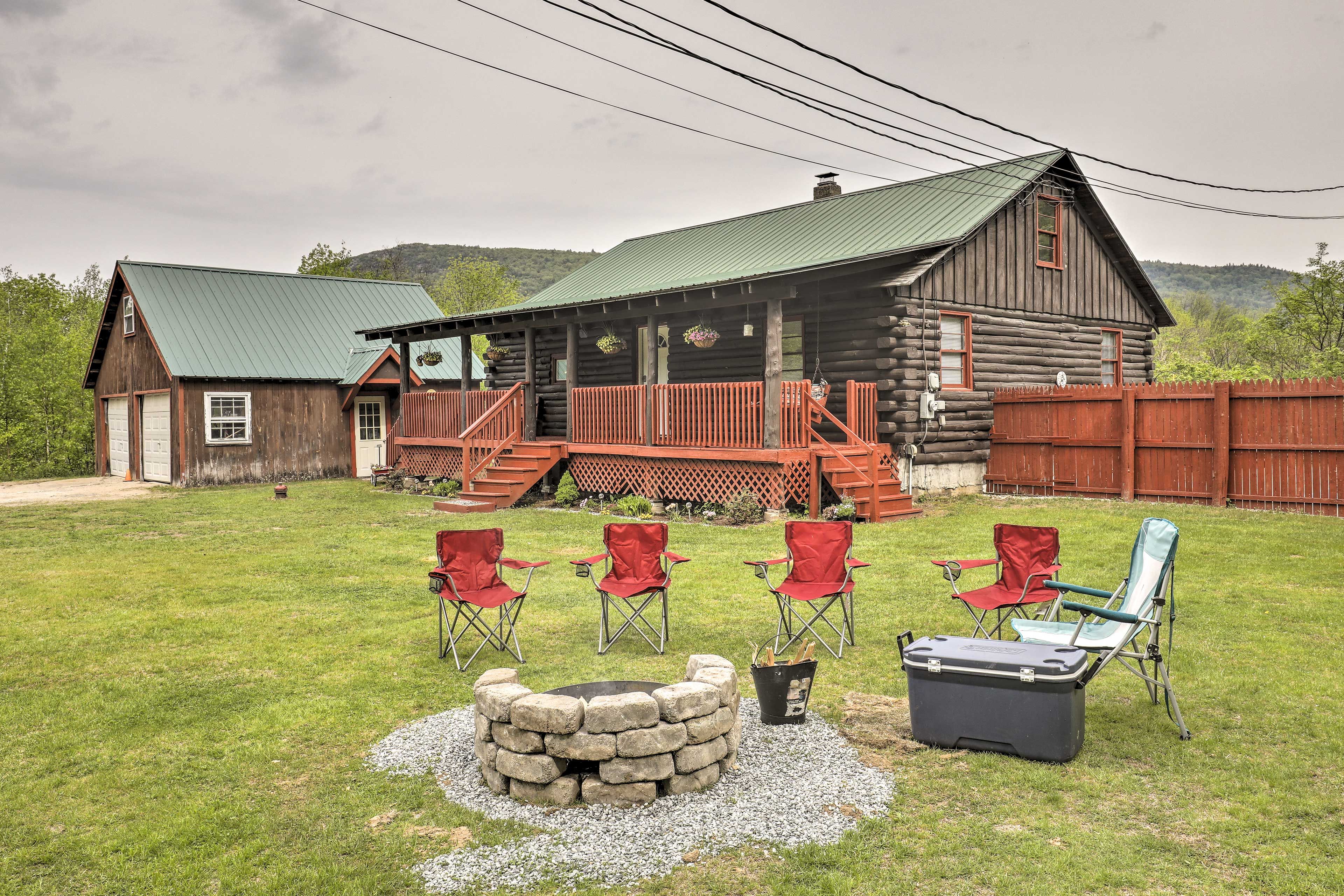 Cabin Exterior | Wood-Burning Fire Pit | Stairs Required for Home Access