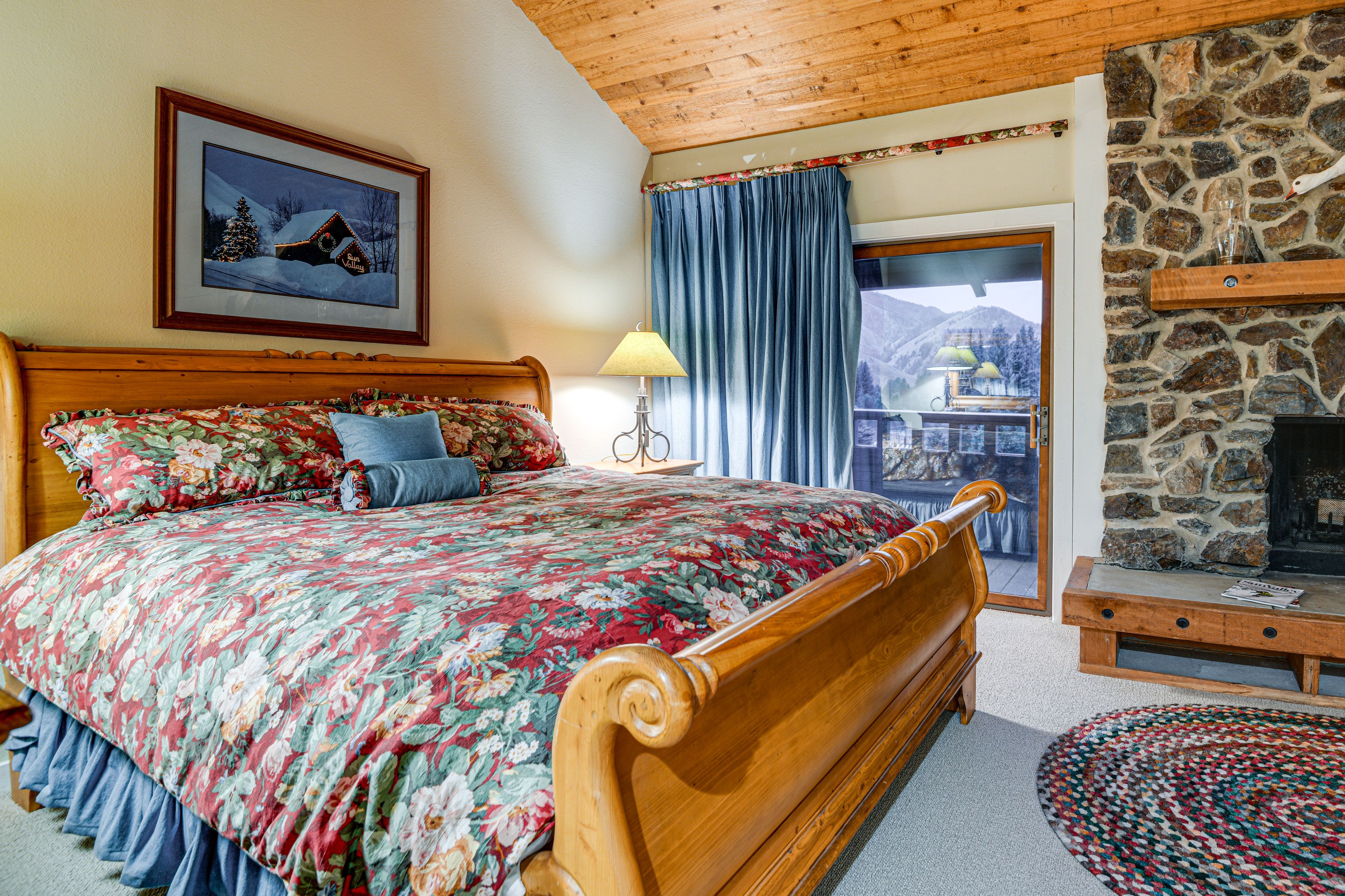 Bedroom 1 | King Bed | Wood-Burning Stove | Balcony Access