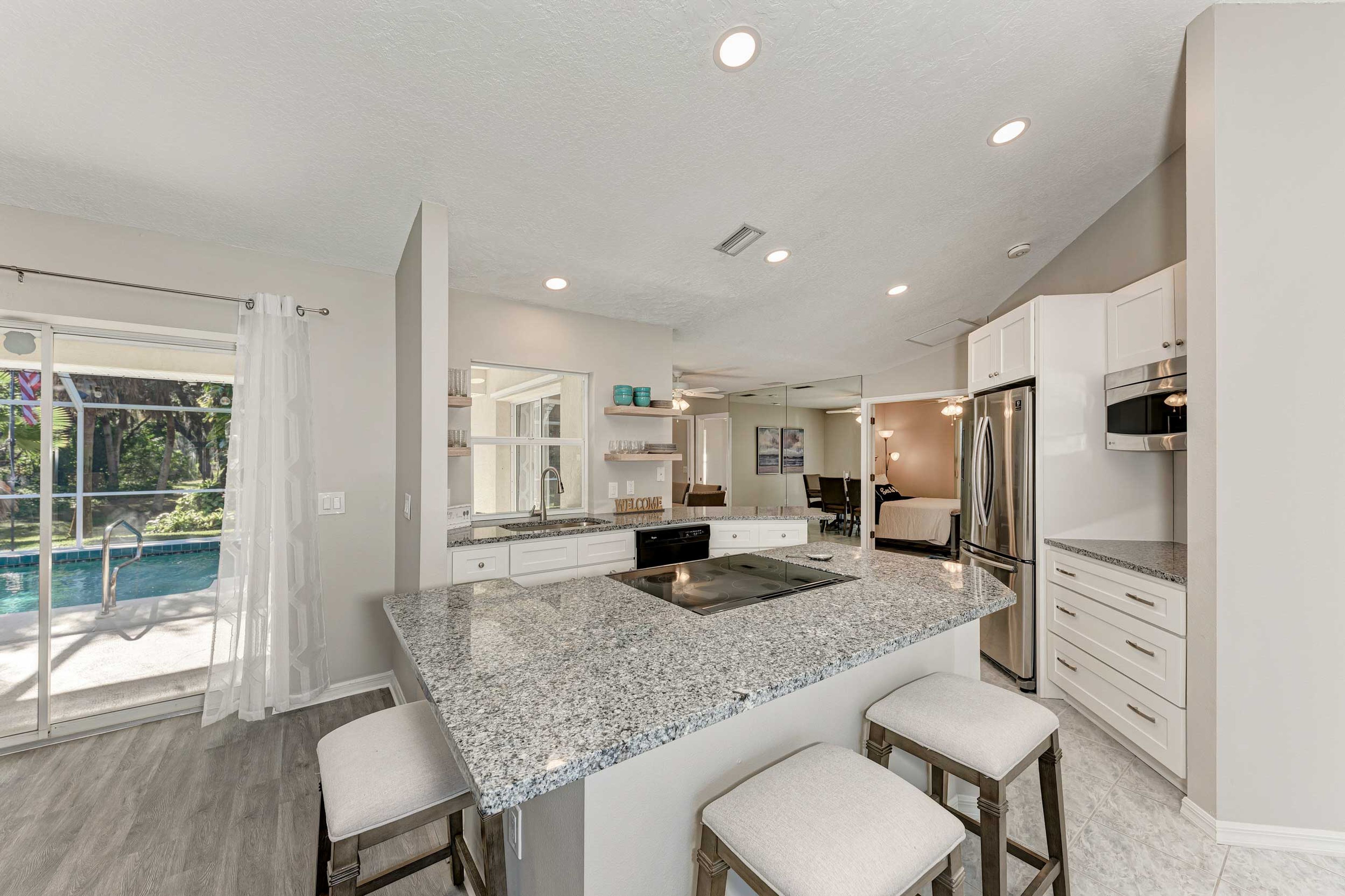 Fully Equipped Kitchen | Lanai Access | Modern Furnishings