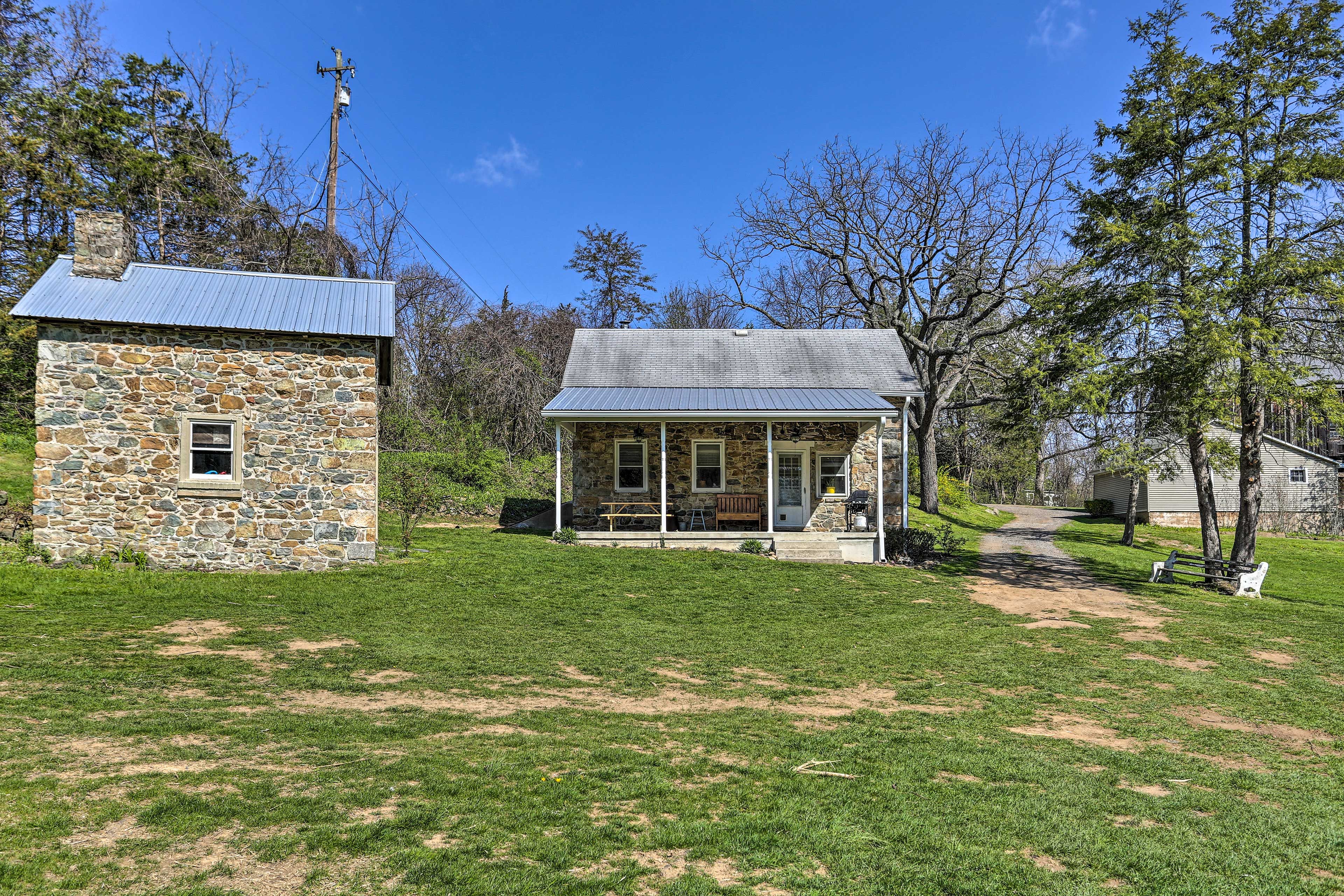 Cottage Exterior | Dirt Driveway Parking (3 Vehicles) | RVs & Trailers Permitted
