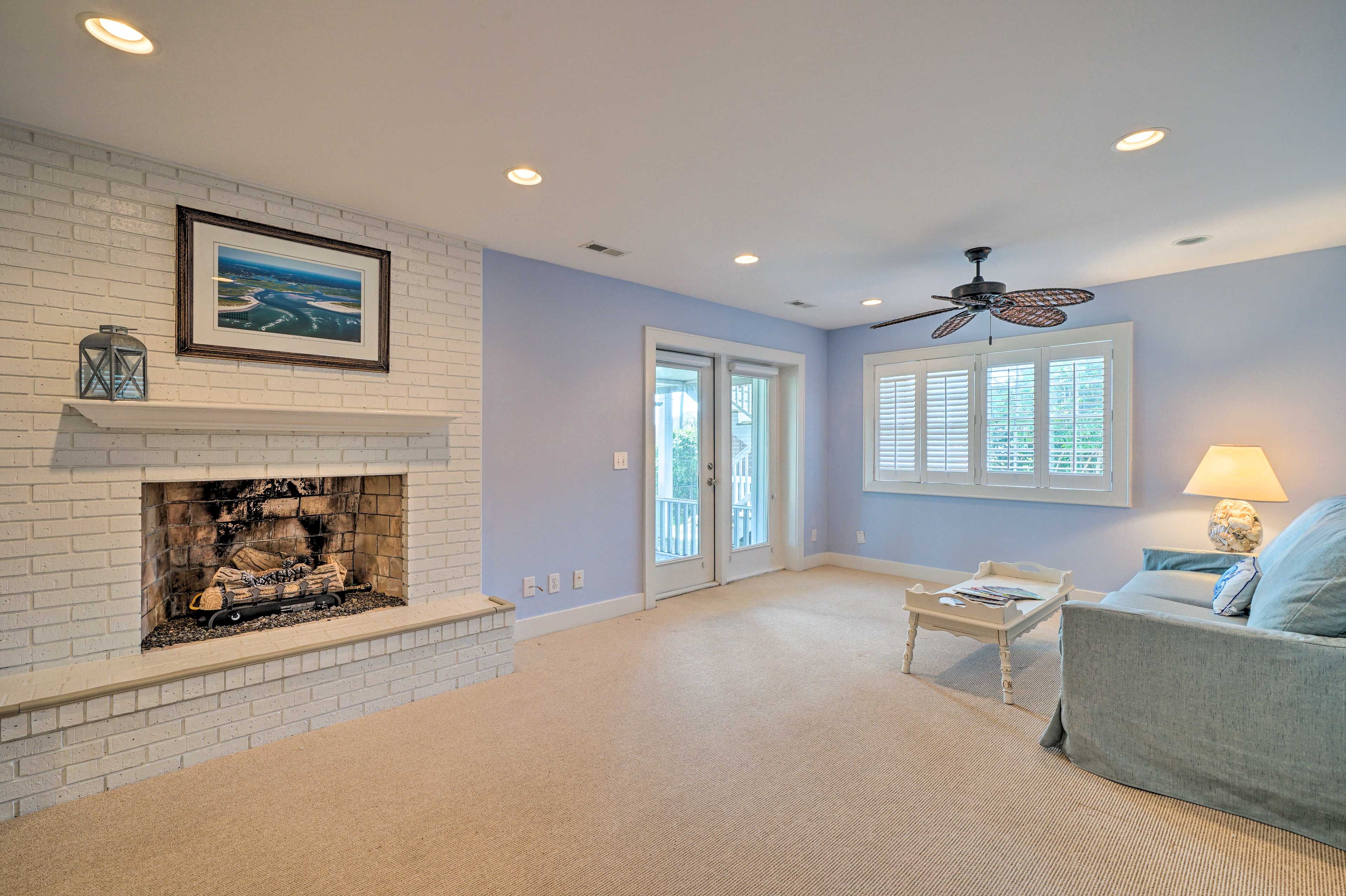Living Room | Lower Level | Fireplace | Access to Bedroom 3