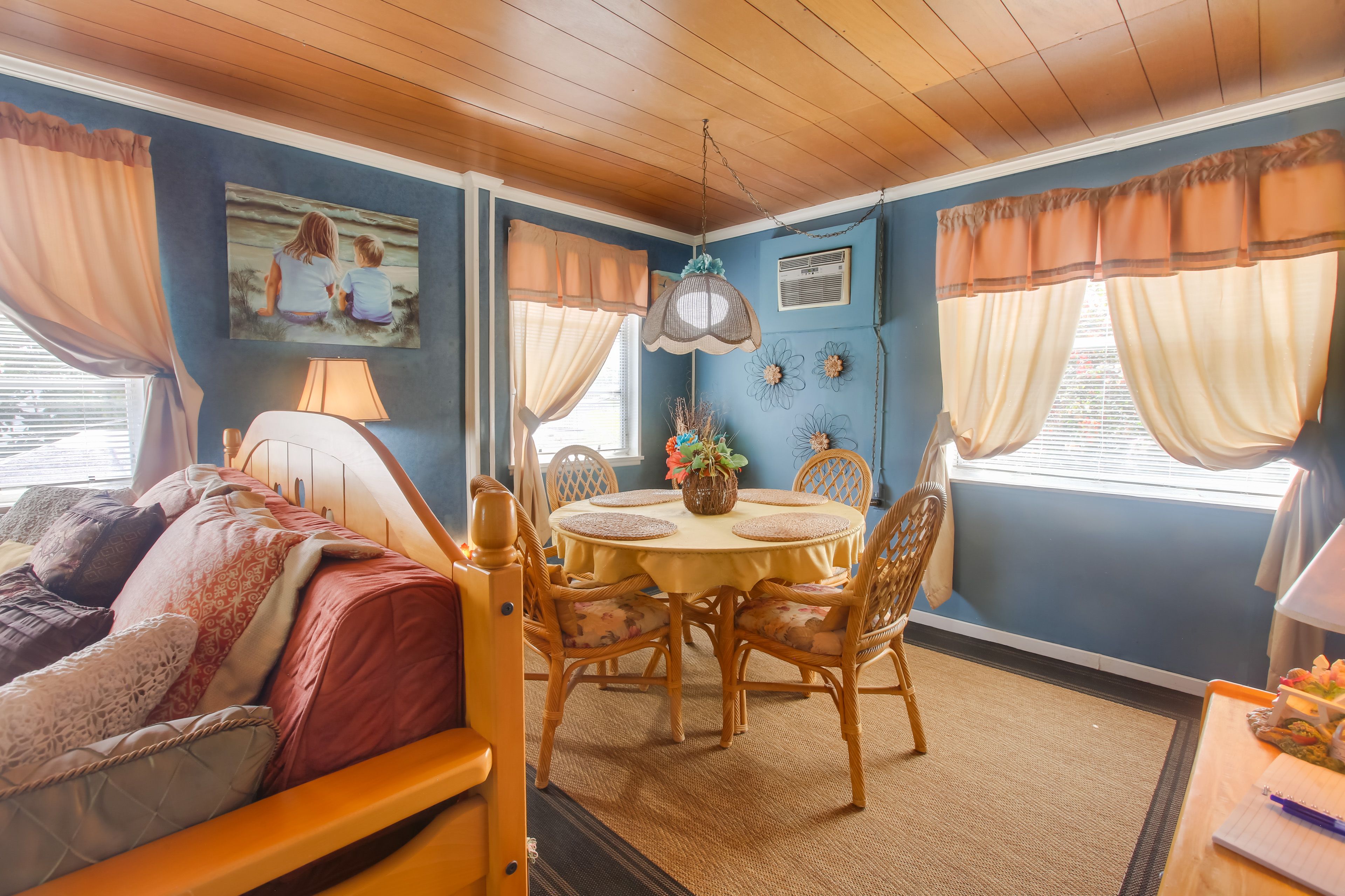 Dining Area | Wall A/C Units | Free WiFi | Dishware & Flatware Provided