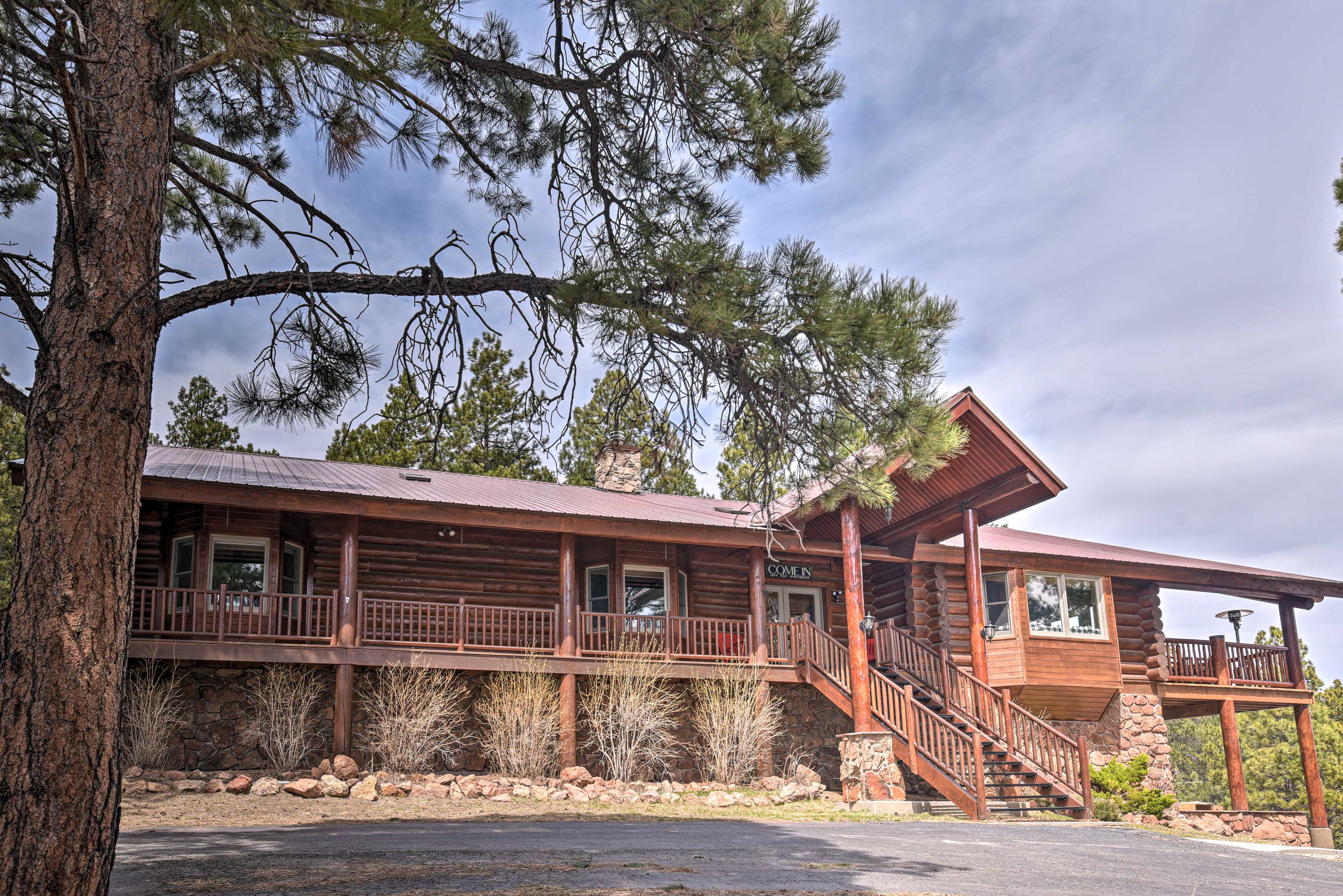 Cabin Exterior | Garage Parking (2 Vehicles) | Covered Parking (8 Vehicles)