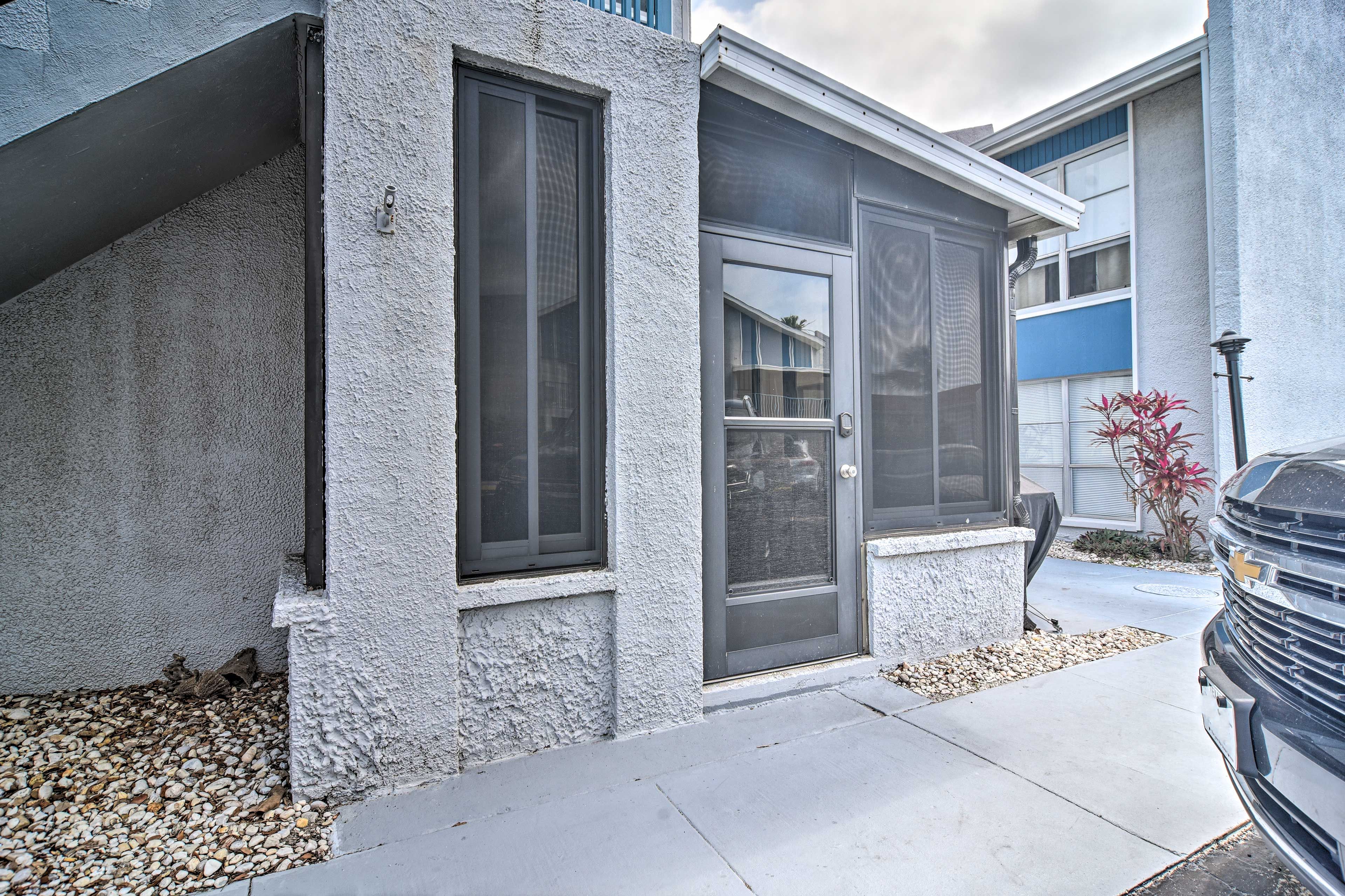 Condo Exterior | Keyless Entry | Community Lot Parking (2 Vehicles Max)