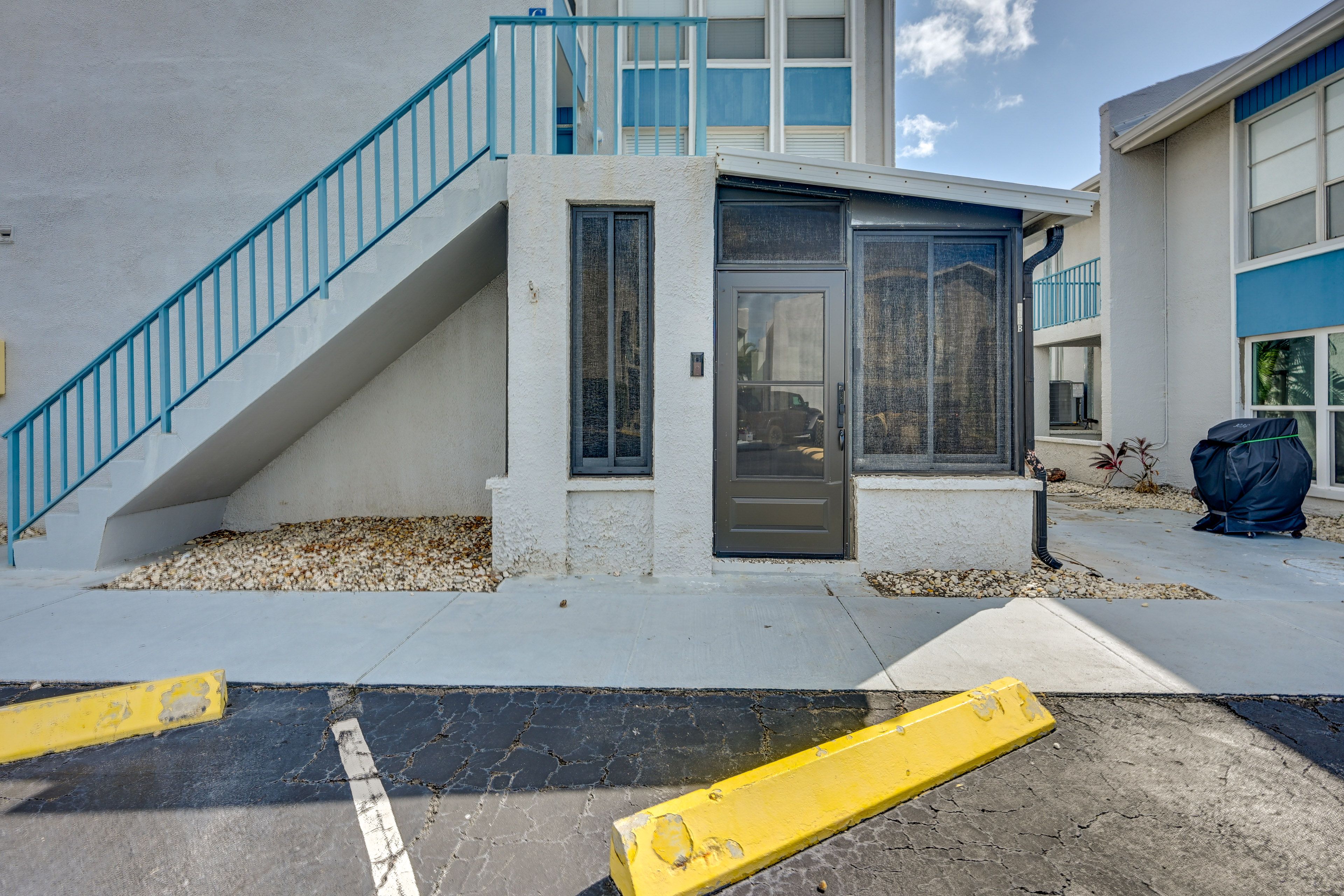 Condo Exterior | Keyless Entry | Community Lot Parking (2 Vehicles Max)