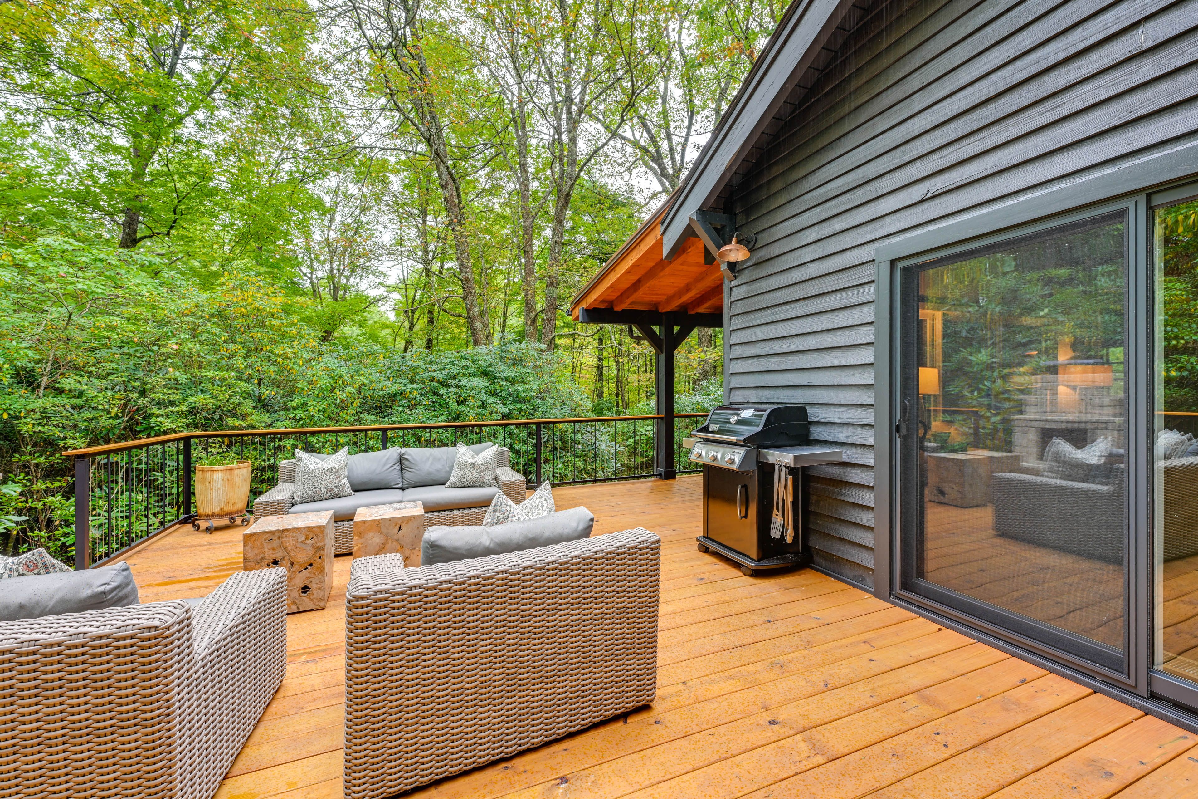 Cabin Exterior | Multi-Level Deck | Outdoor Fireplace