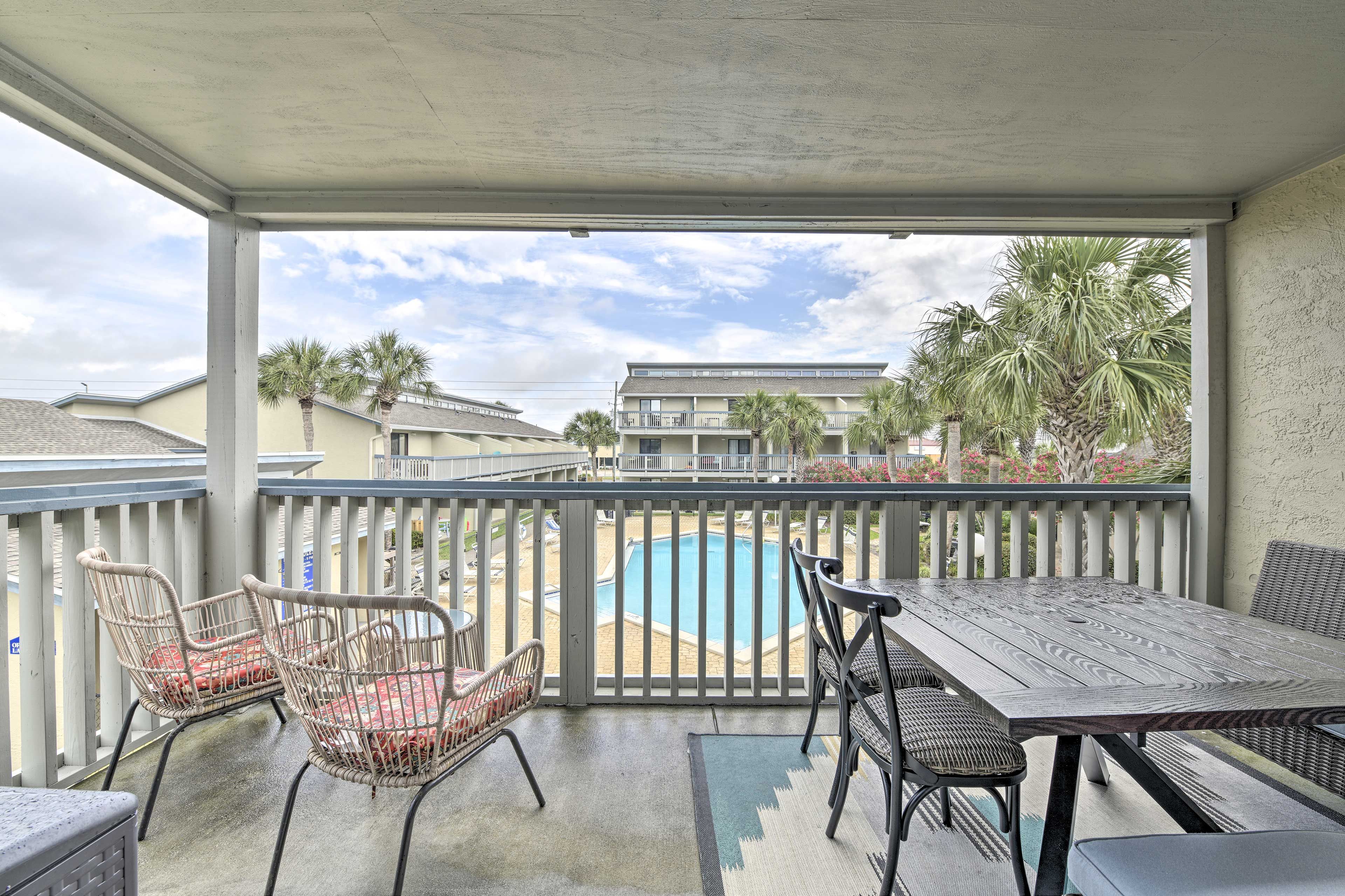 Private Balcony | Outdoor Dining Table | Seating | Community Pool View