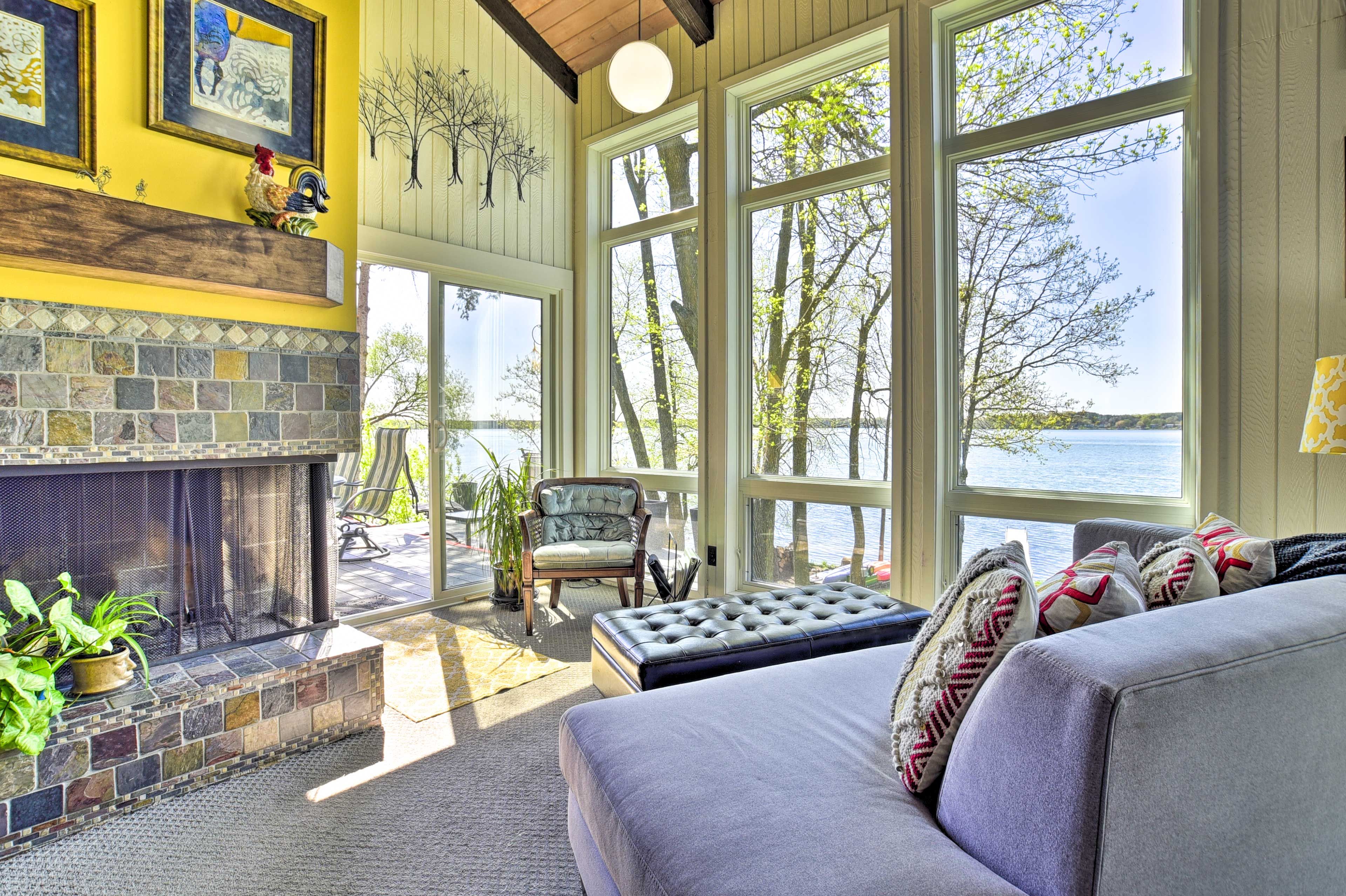 Great Room | Green Lake Views | Wood-Burning Fireplace