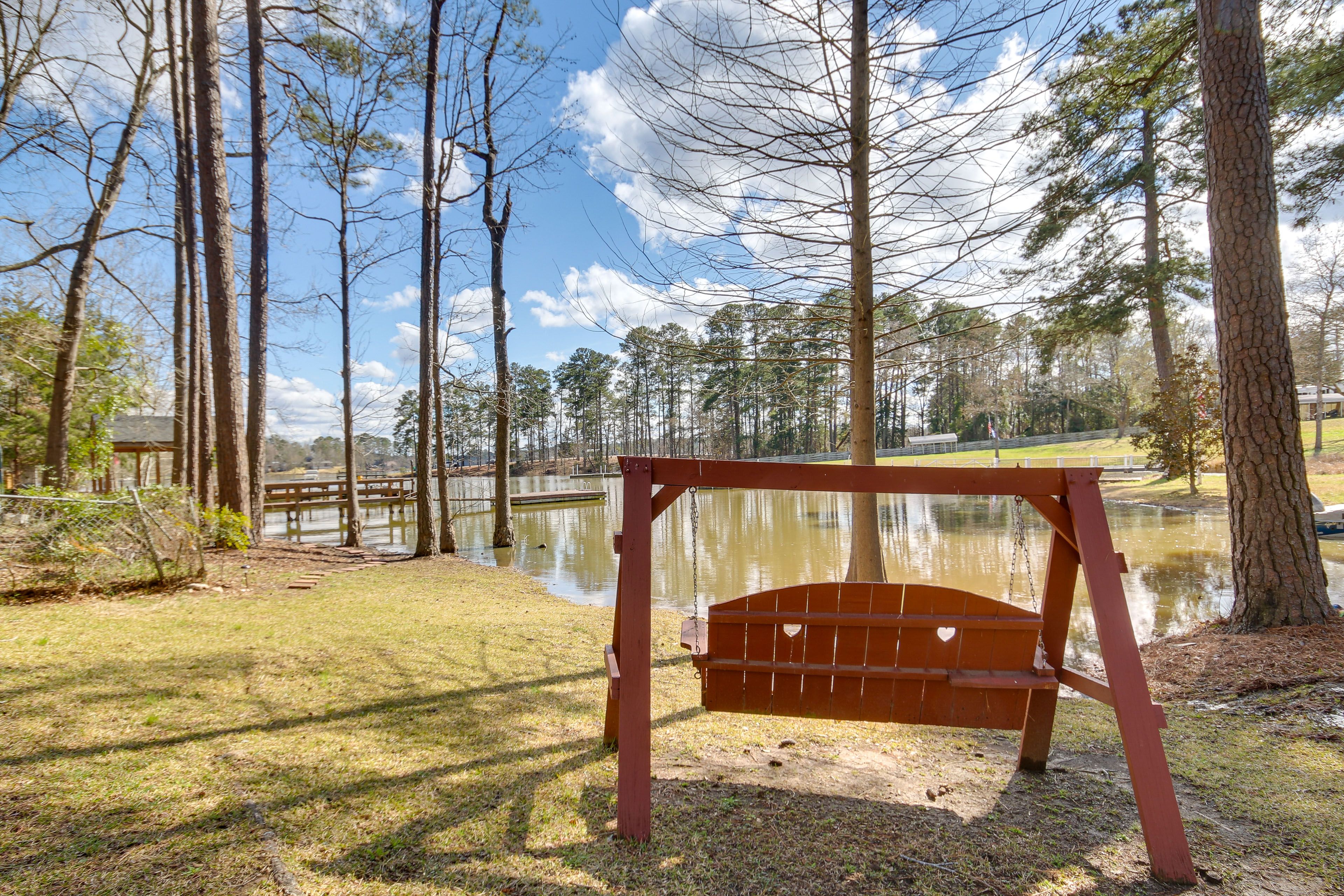 Yard | Lake Views | Shared Boat Dock | Bench Swing