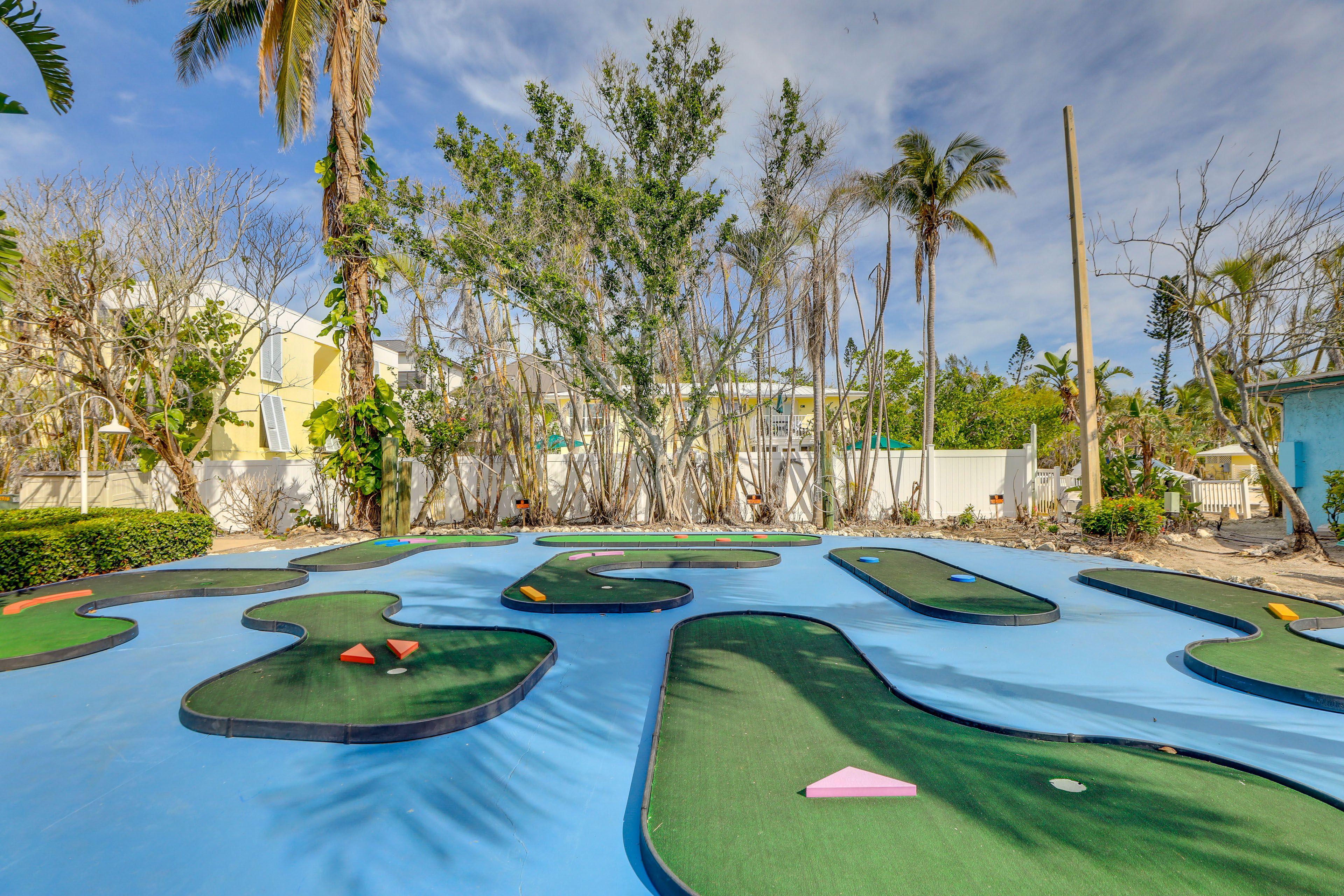 Mini Golf Course | Shuffleboard Court | Grilling Station
