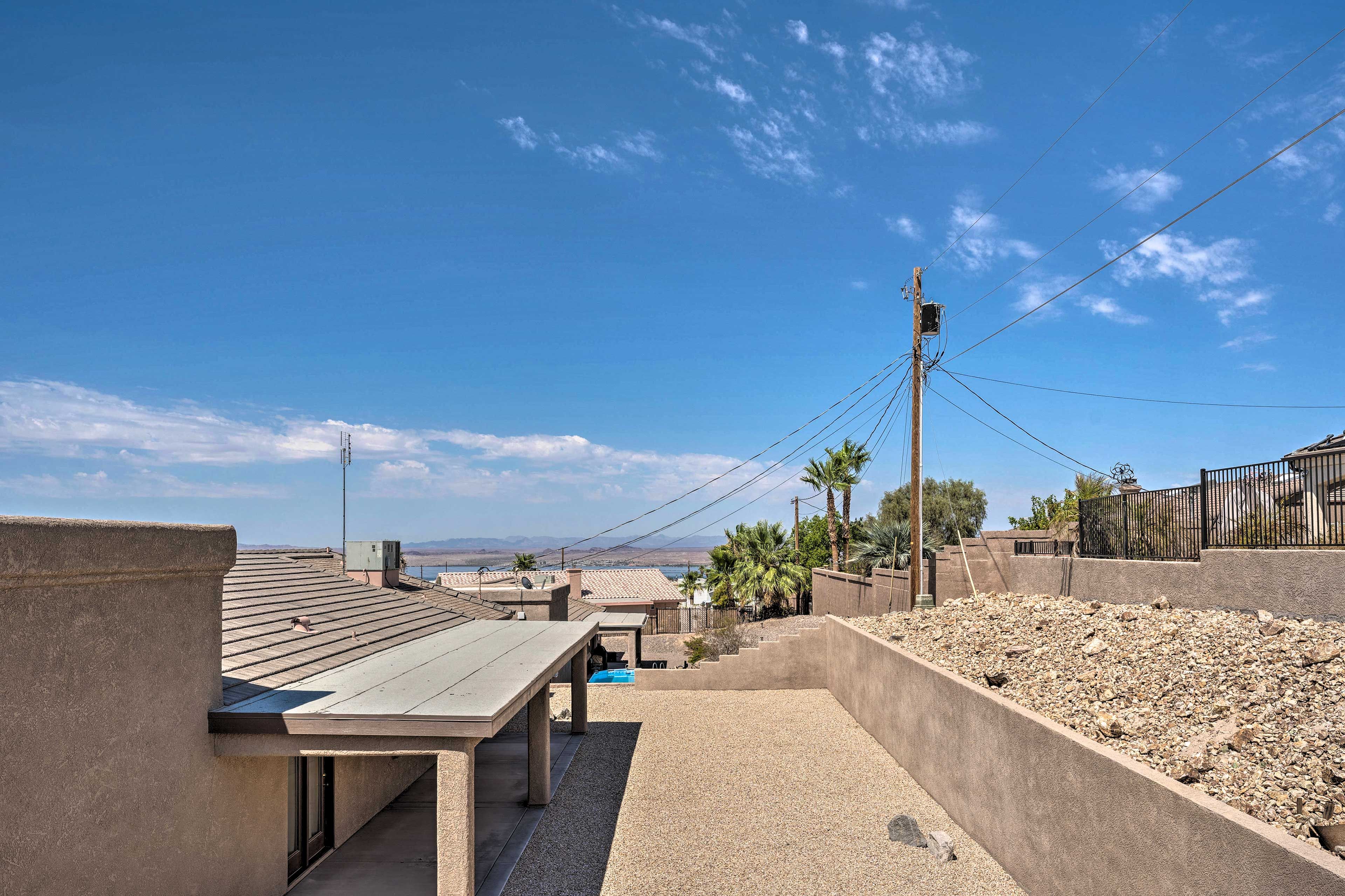 Private Enclosed Backyard | Peekaboo Lake & Mountain Views