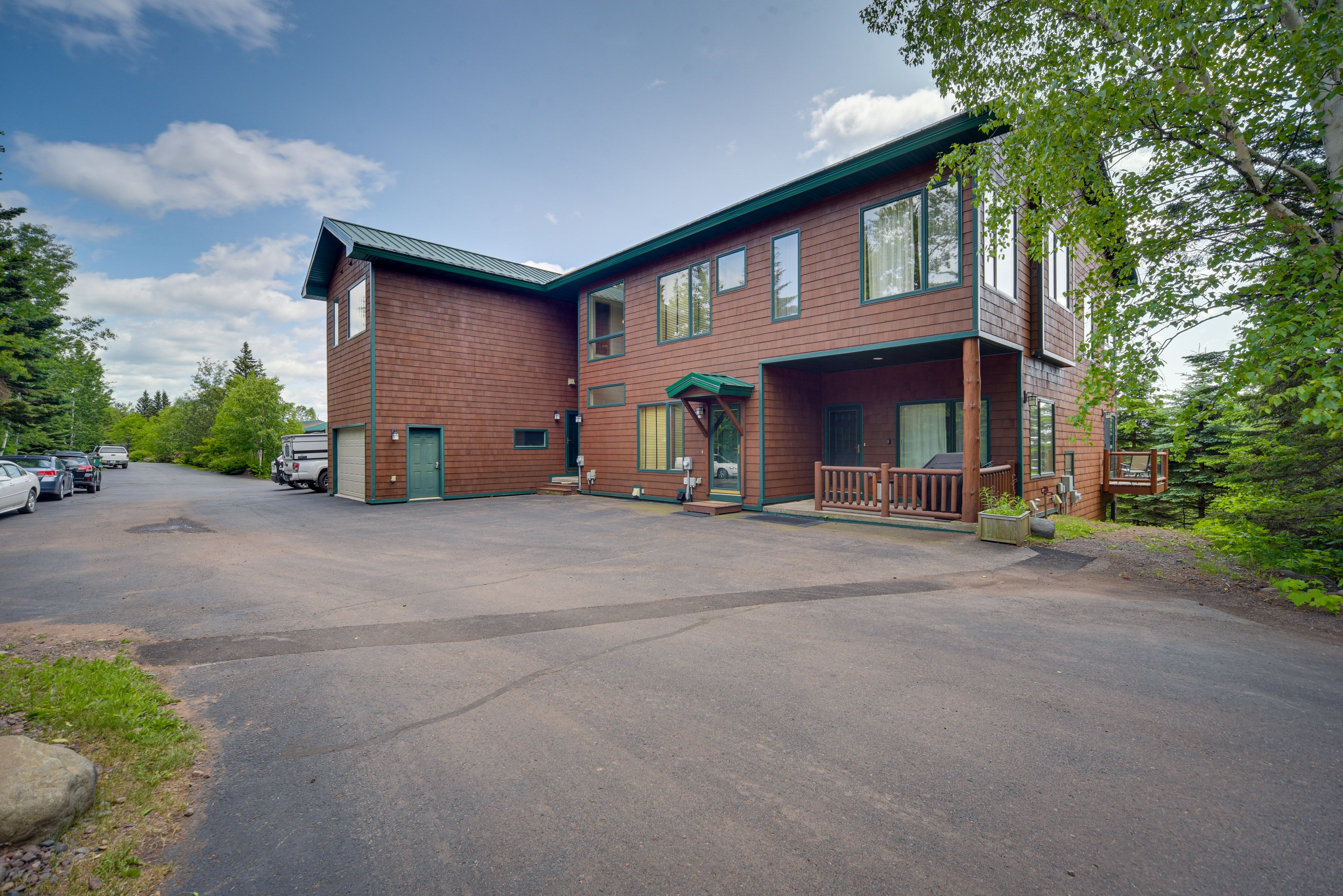 Parking | Open Community Lot (2 Vehicles) | Trailer Parking Allowed On-Site