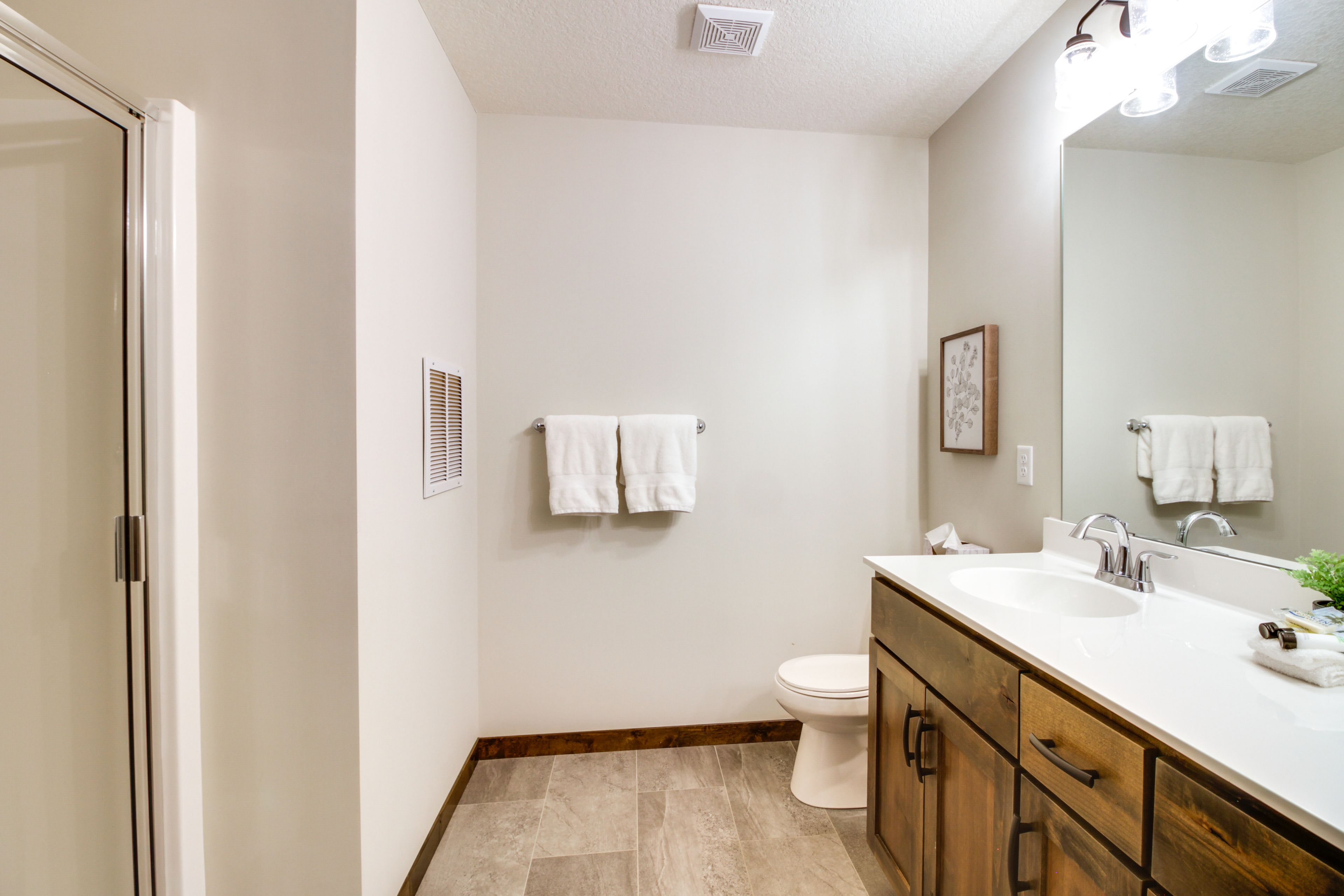 En-Suite Bathroom | Walk-In Shower | Complimentary Toiletries