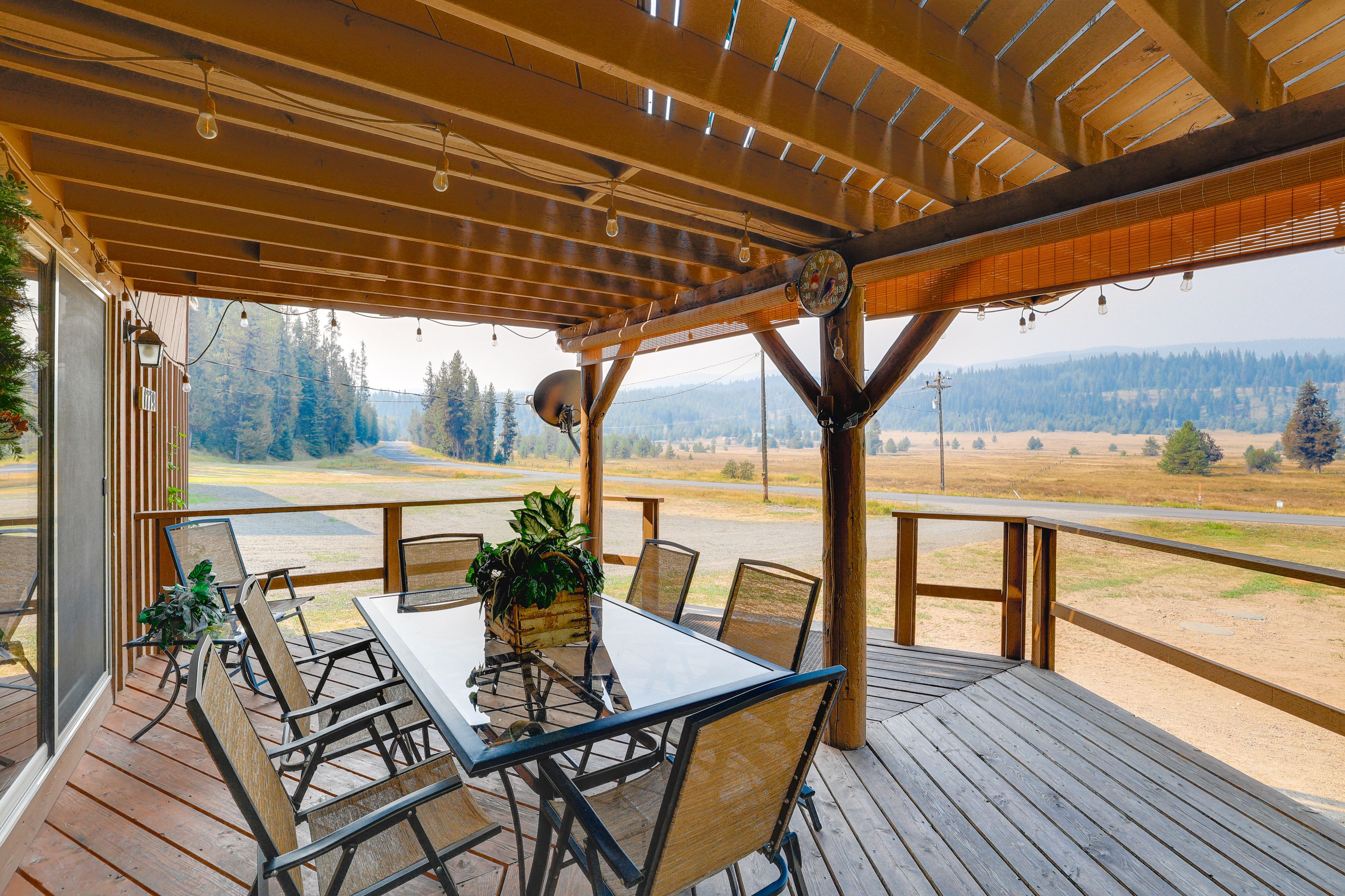 Front Deck | Dining Area | Red River Meadow Views