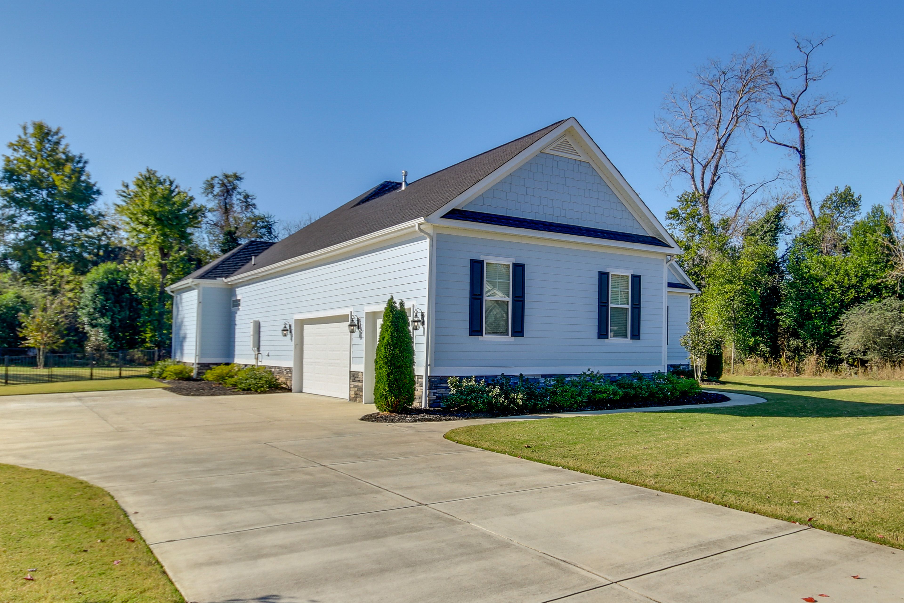 Parking | Driveway (4 Vehicles) | No Garage Access