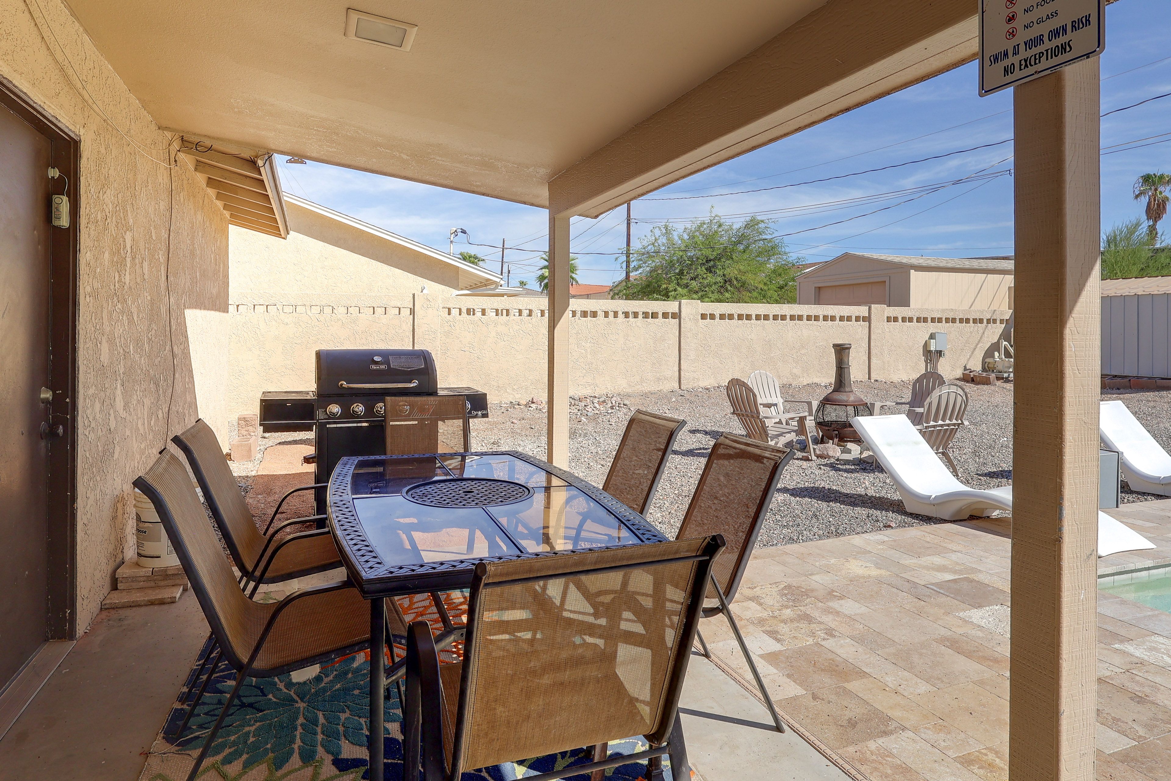 Property Exterior | Fenced-in Yard | Covered Patio | Fire Pit