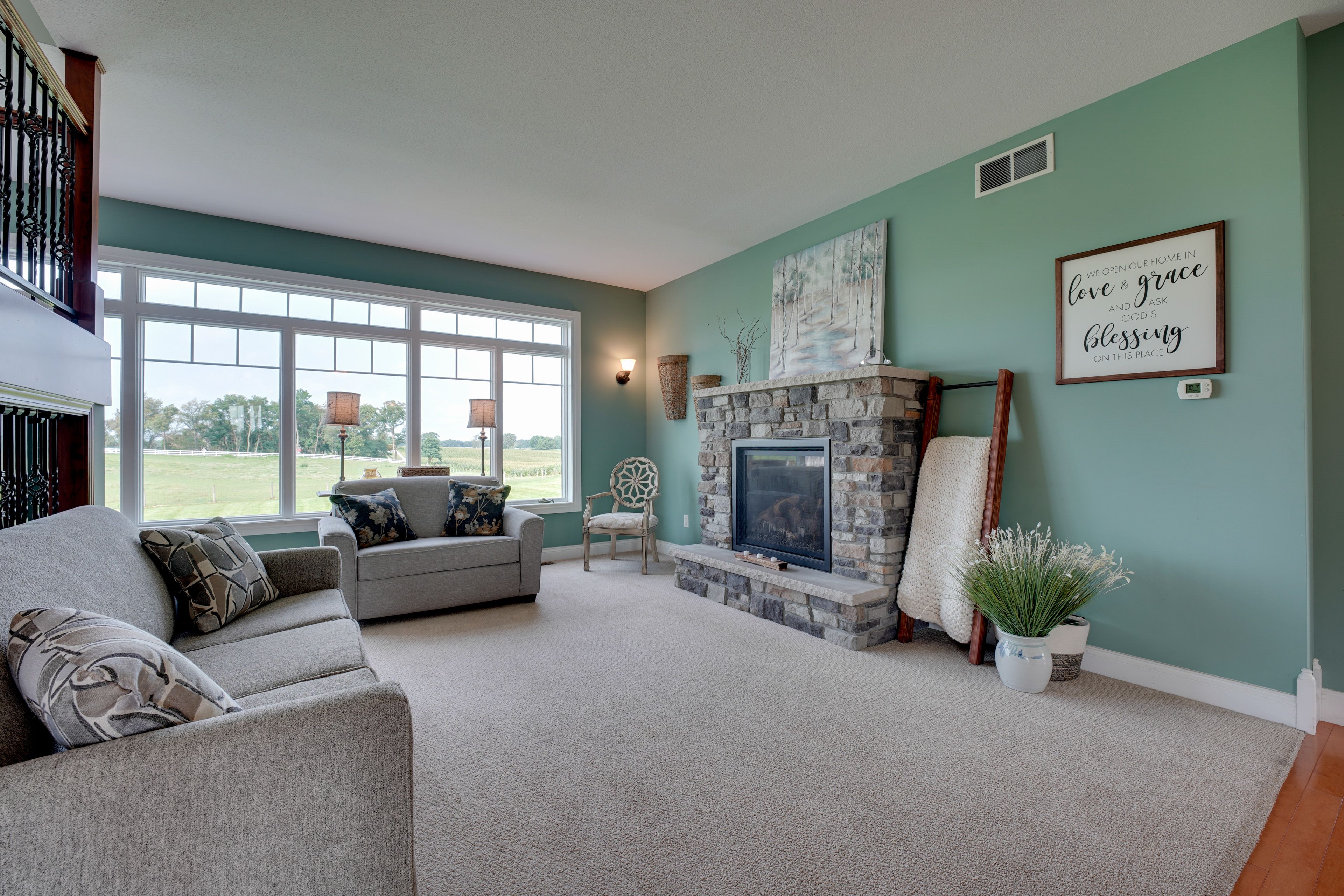 Living Room | Books | Movie Library | Picture Windows | Gas Fireplace