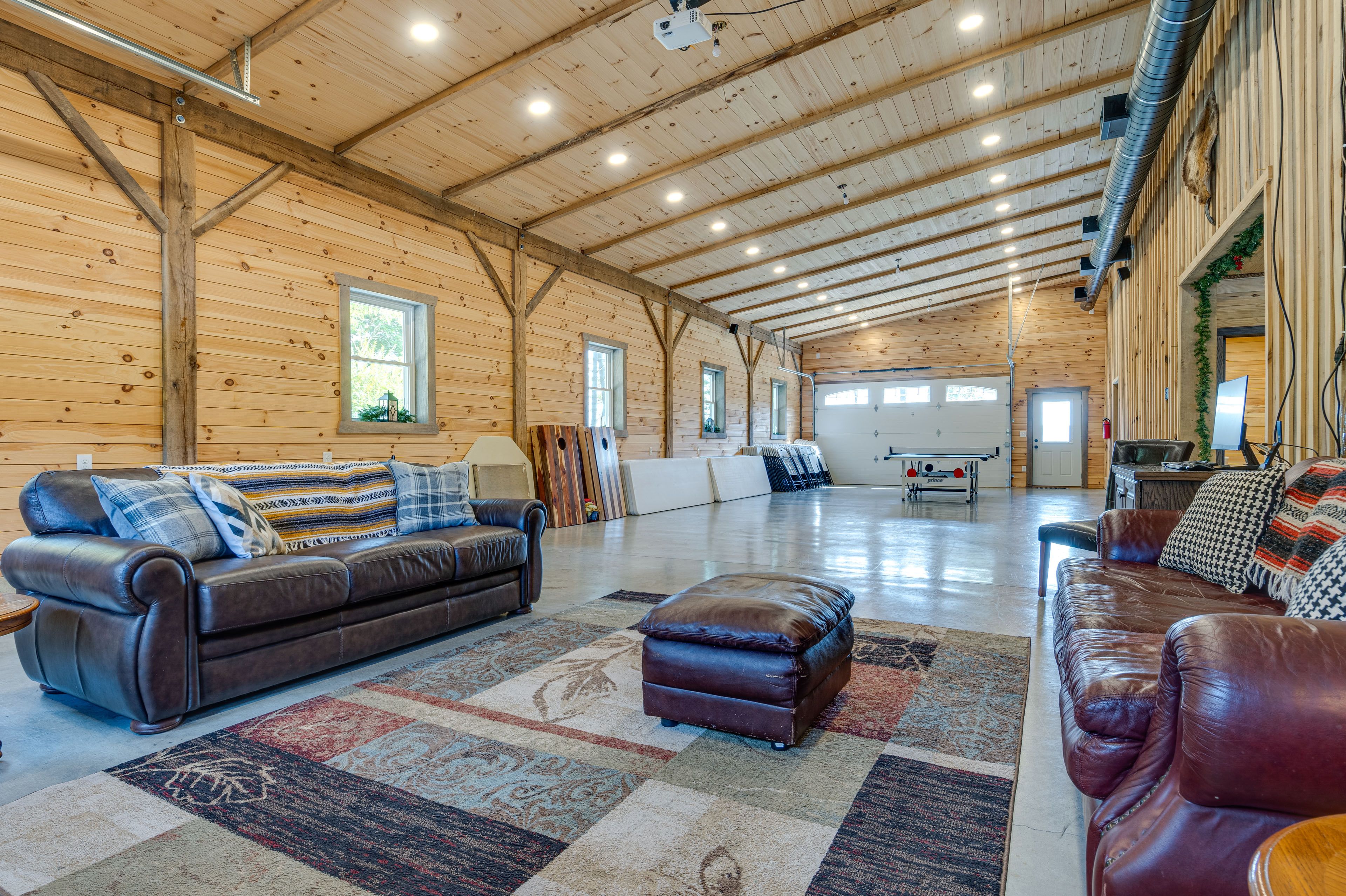 Garage Living Space | Sleeper Sofa | Ping Pong Table | Cornhole